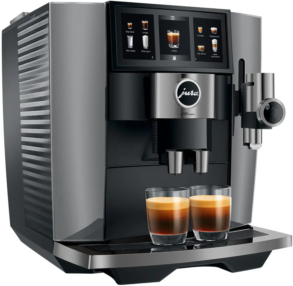 Eine Jura-Kaffeemaschine mit Touchscreen. Zwei Espressogläser stehen davor. Die Maschine hat ein metallisches Finish.