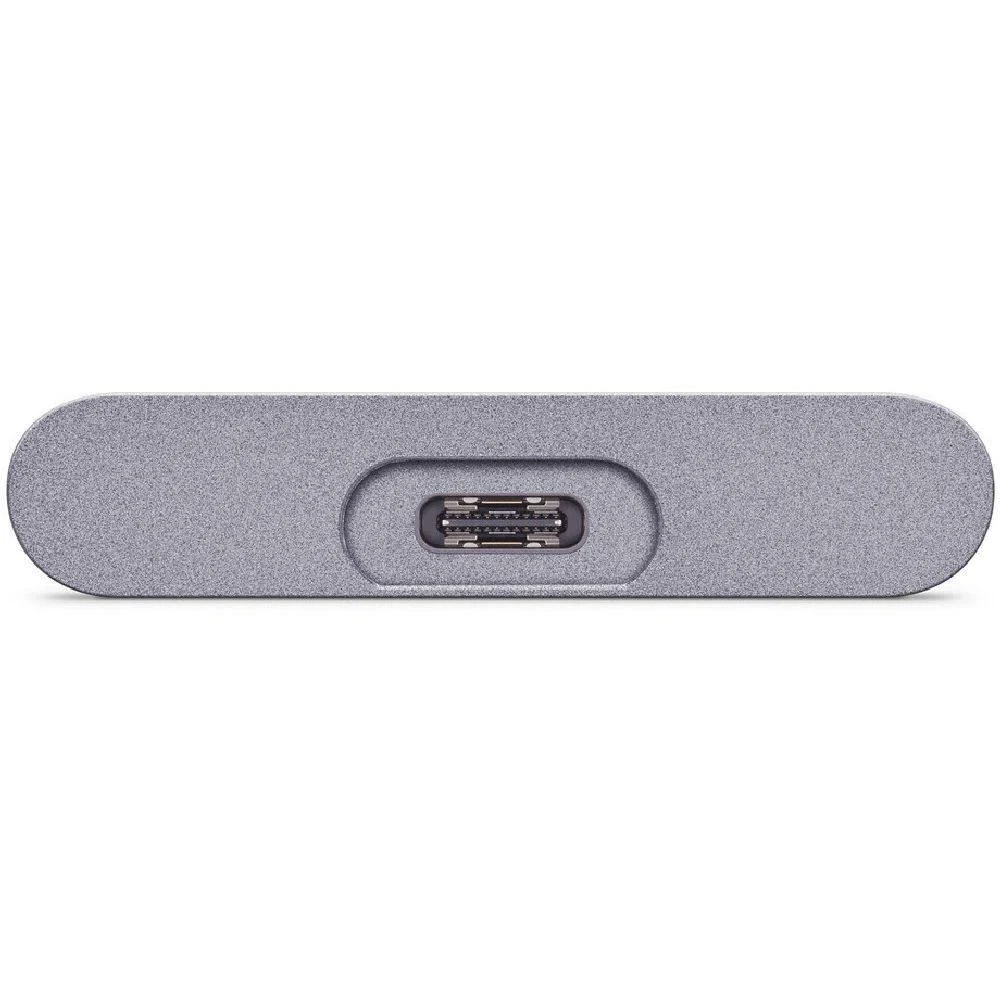 Un dispositivo gris rectangular con un puerto USB-C en el centro. El dispositivo tiene bordes redondeados y una superficie texturizada.