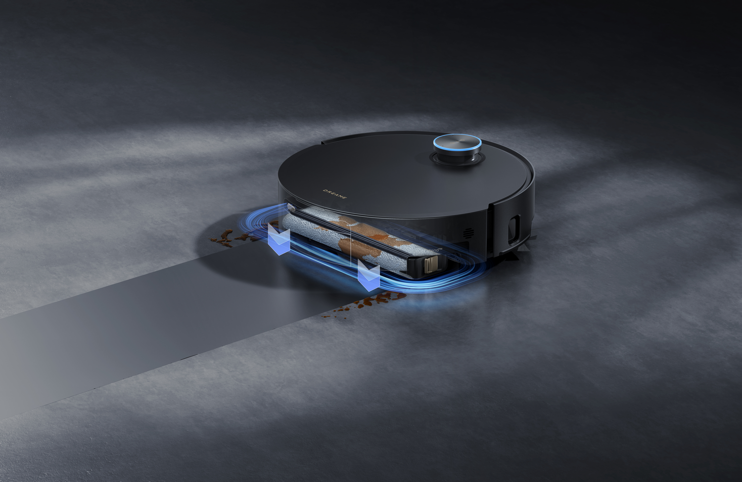 Una aspiradora robot negra limpia un suelo oscuro. Tiene una luz azul en la parte superior y muestra la ruta de limpieza.