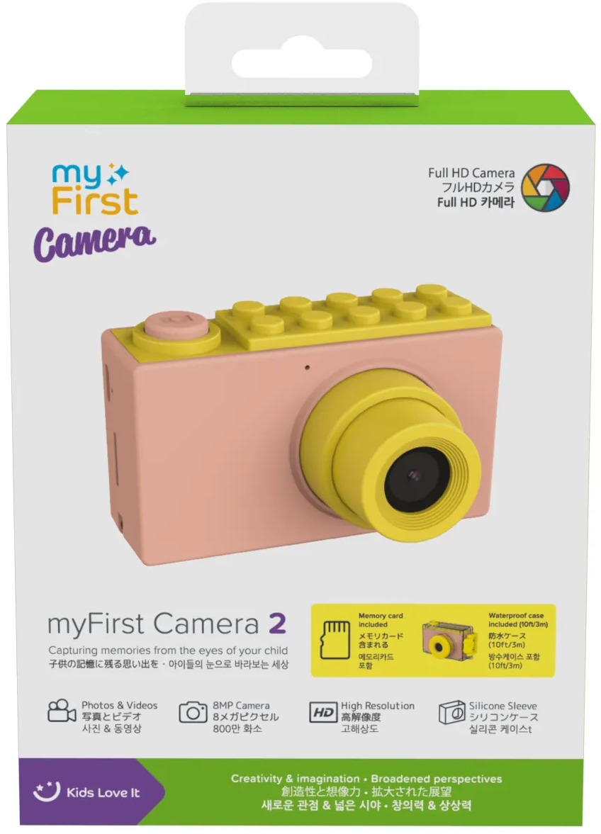 Appareil photo jouet rose et jaune sur une boîte. Le texte comprend 'myFirst Camera 2', des fonctionnalités et 'Kids Love It'.
