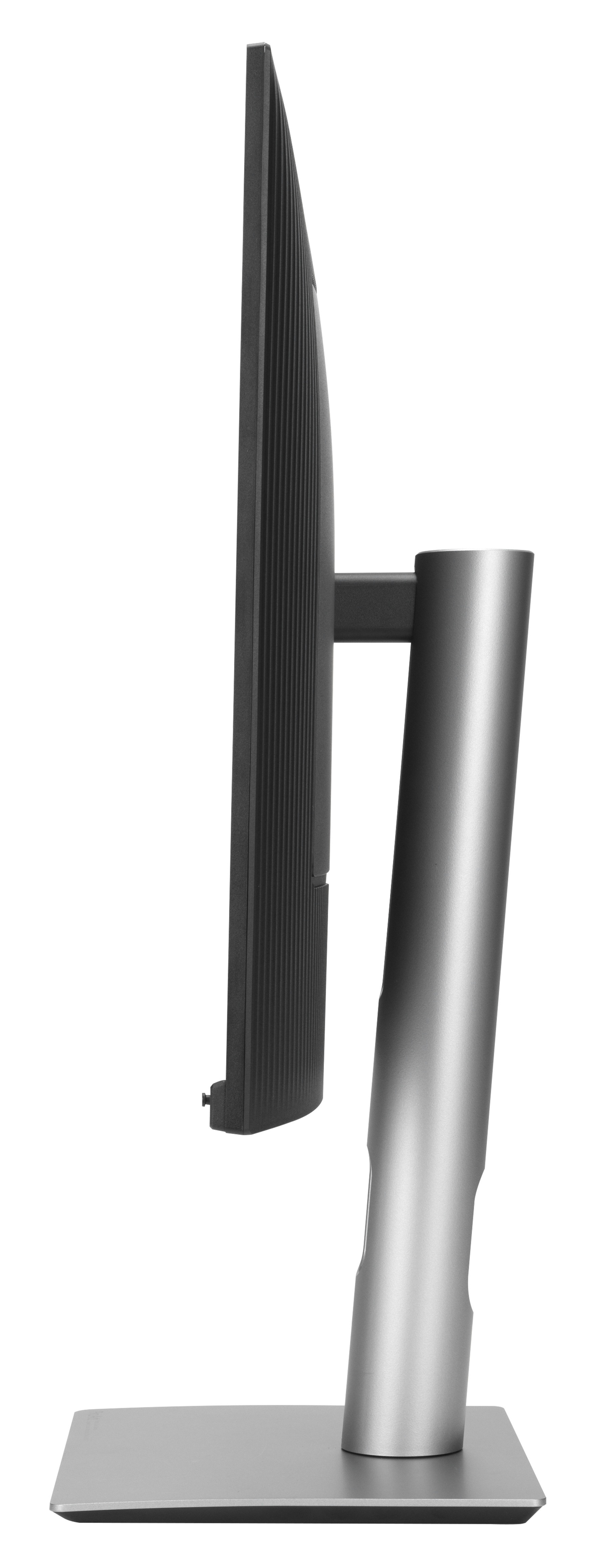Widok z boku monitora komputera. Czarny ekran i ramka, srebrna podstawka i prostokątna podstawa. Białe tło.