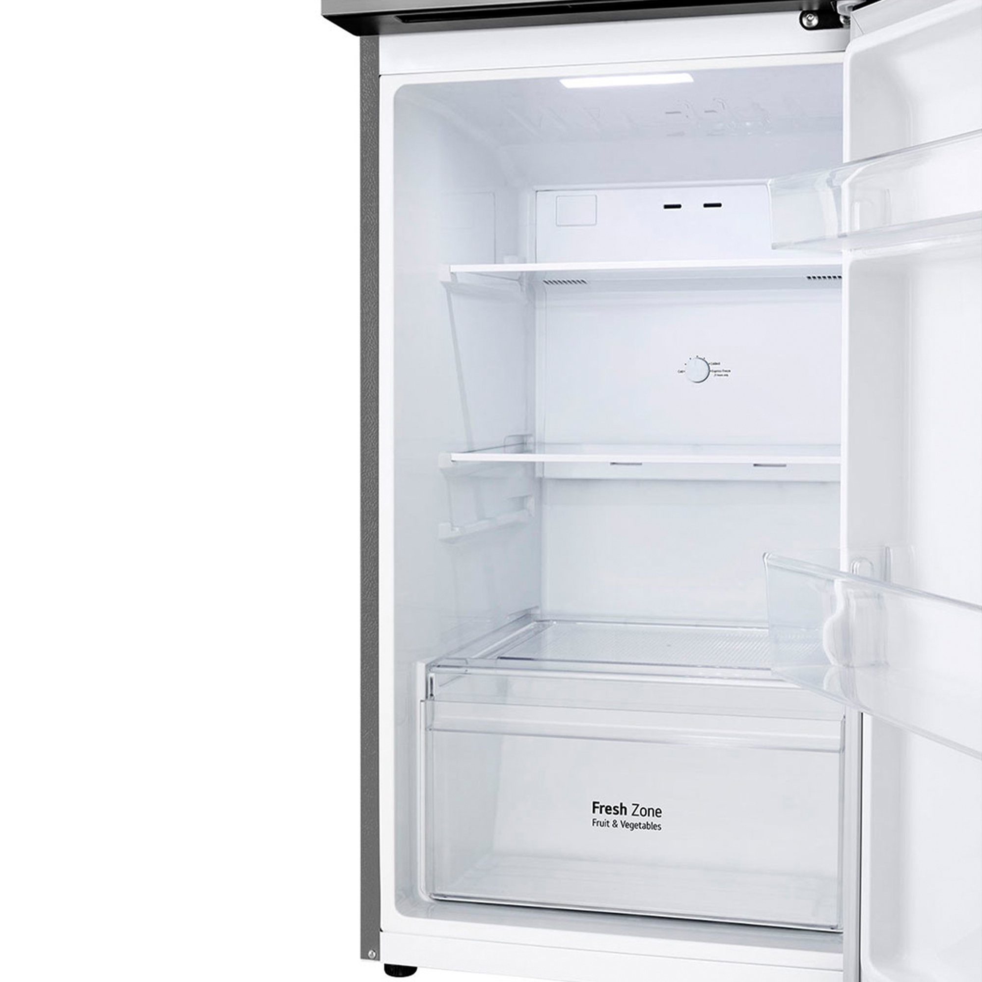 Interior de refrigerador abierto con estantes, un cajón 'Fresh Zone' y una perilla de control. La puerta está abierta, mostrando un interior blanco limpio.