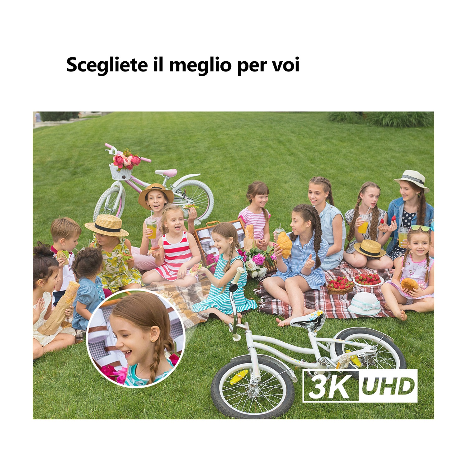 Bambini a un picnic sull'erba. Due biciclette, una coperta da picnic e un cerchio con la faccia di una ragazza. Testo 3K UHD in basso.