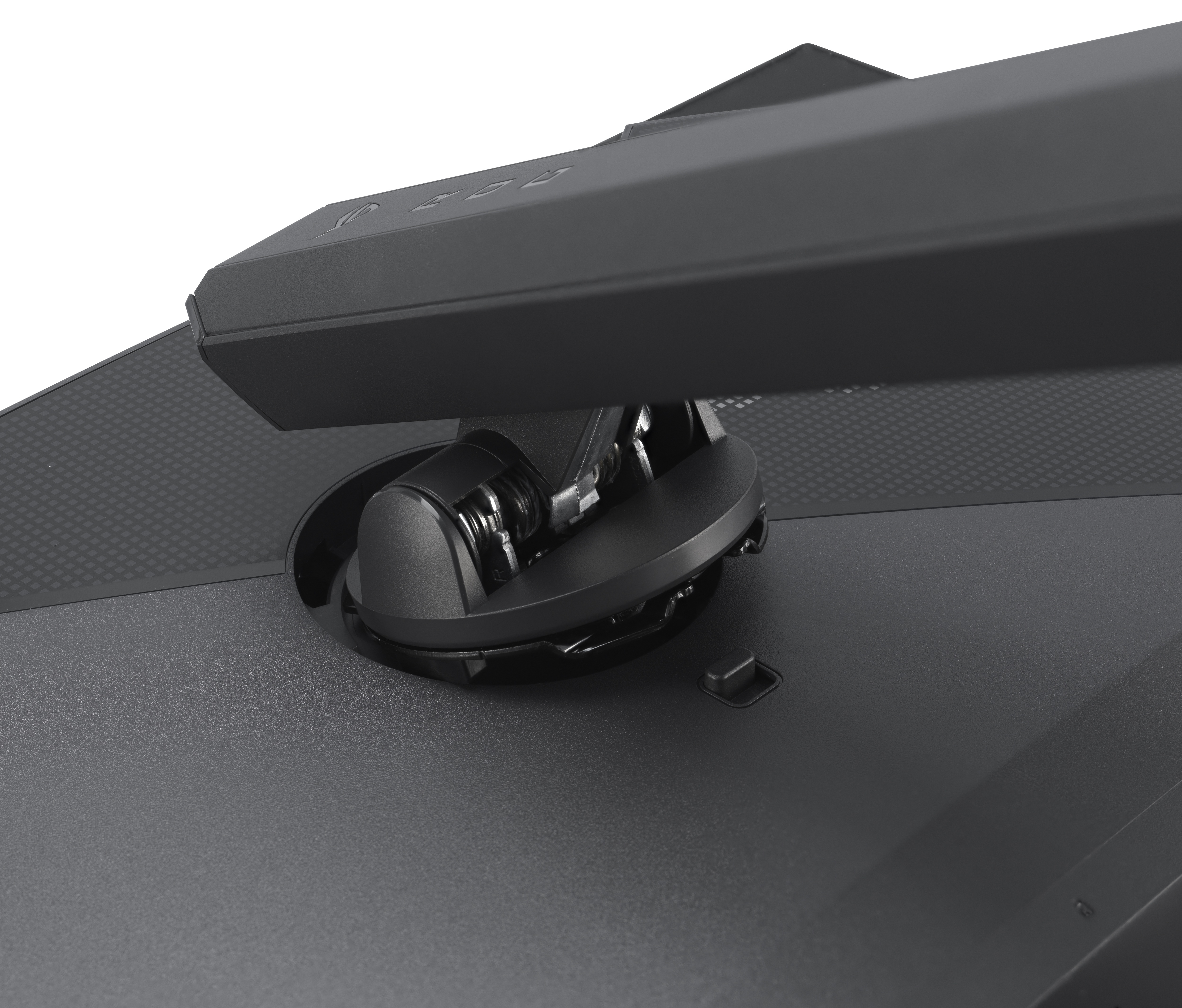 Zbliżenie czarnej podstawy monitora z mechanizmem obrotowym. Podstawa jest teksturowana i ciemnoszara.