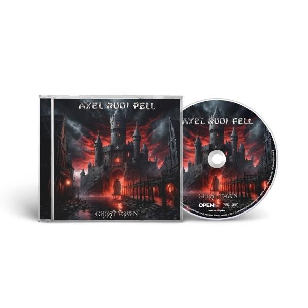 CD-Hülle und Disc. Cover: Burg, dunkler Himmel. Disc: Axel Rudi Pell, Ghost Town. Hülle: Ghost Town, Axel Rudi Pell. Weißer Hintergrund.