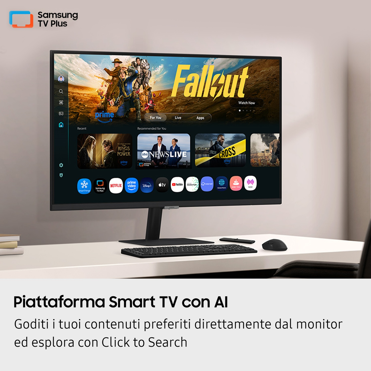 Un monitor mostra un'interfaccia TV. Mostra lo show Fallout e le icone delle app. Una tastiera e un mouse sono davanti al monitor.
