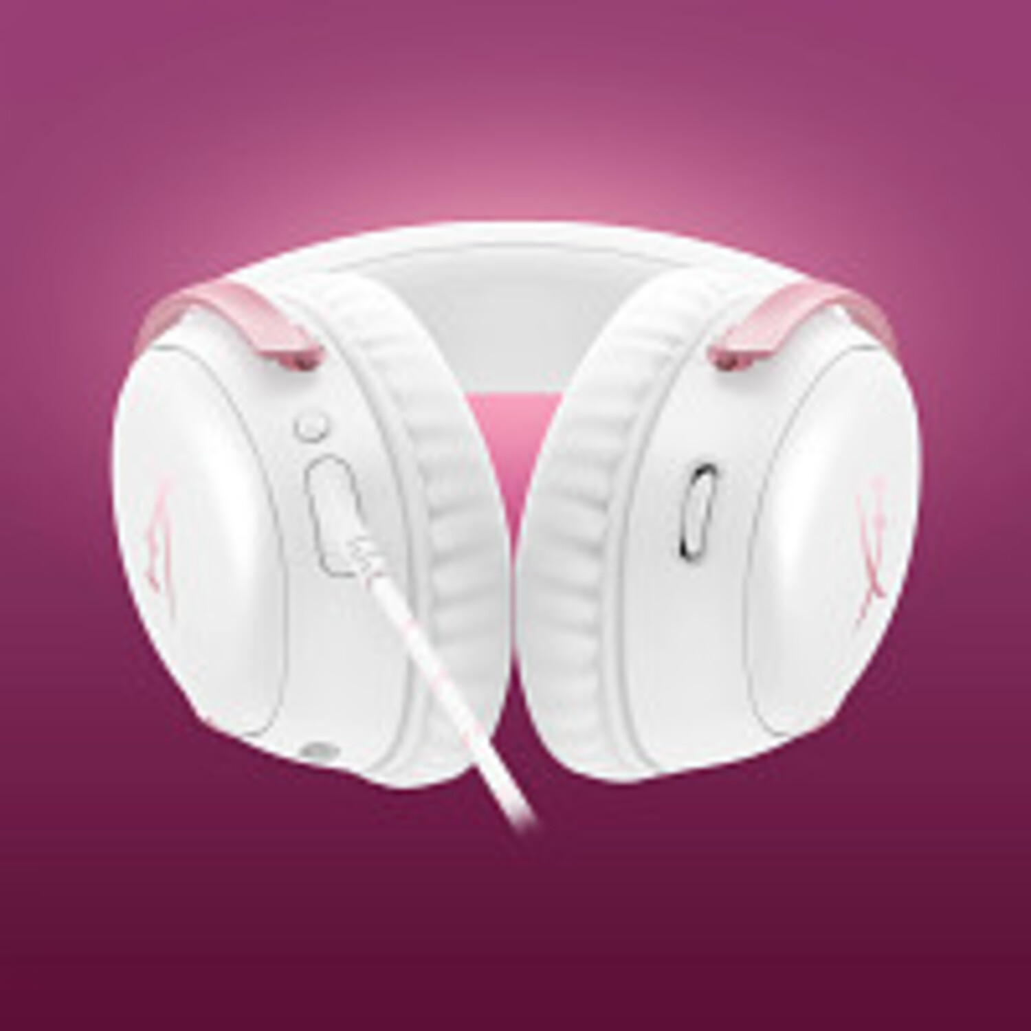 Auriculares para juegos blancos y rosas sobre un fondo morado degradado. El auricular tiene un cable.