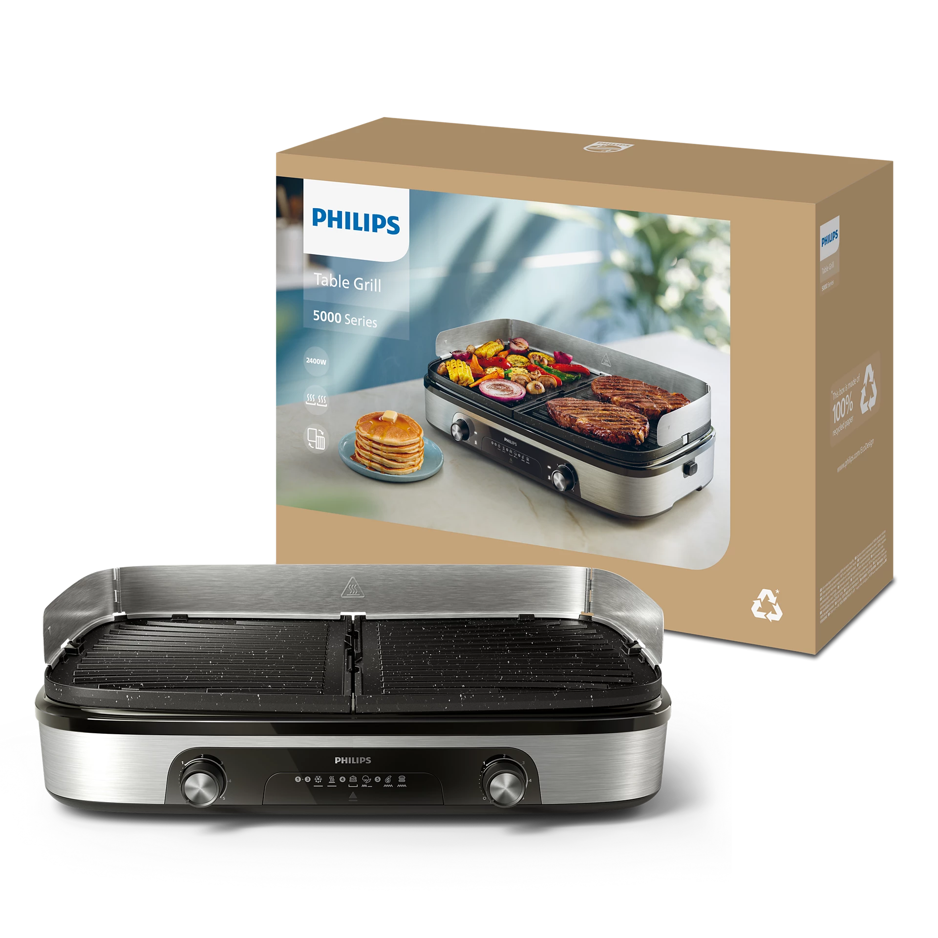 Una parrilla de mesa Philips con una caja, mostrando comida a la parrilla y panqueques. La parrilla es plateada y negra.