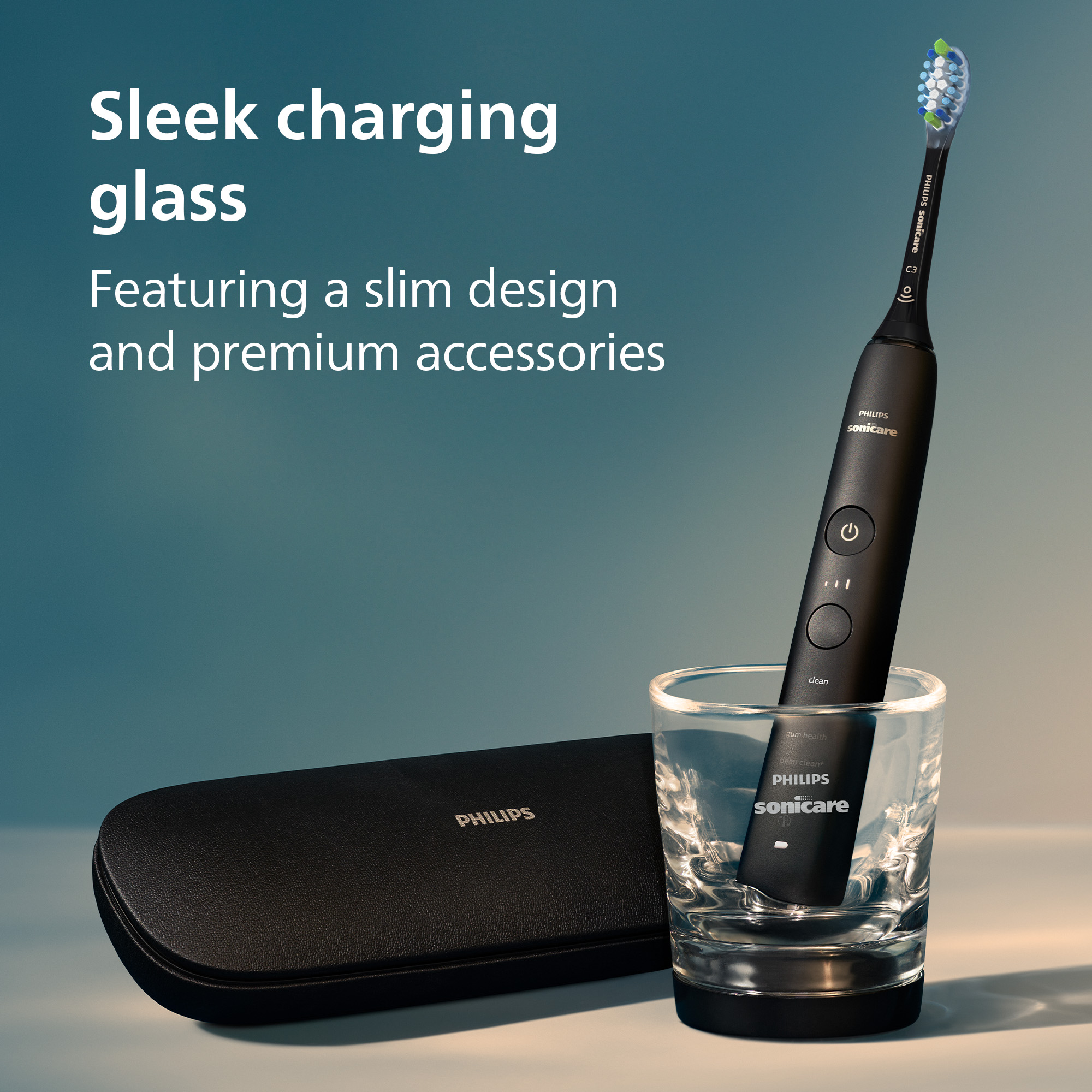 Schwarze Philips Sonicare Zahnbürste in einem Glas. Ein schwarzes Etui liegt links. Text: Schlankes Ladeglas, schlankes Design.