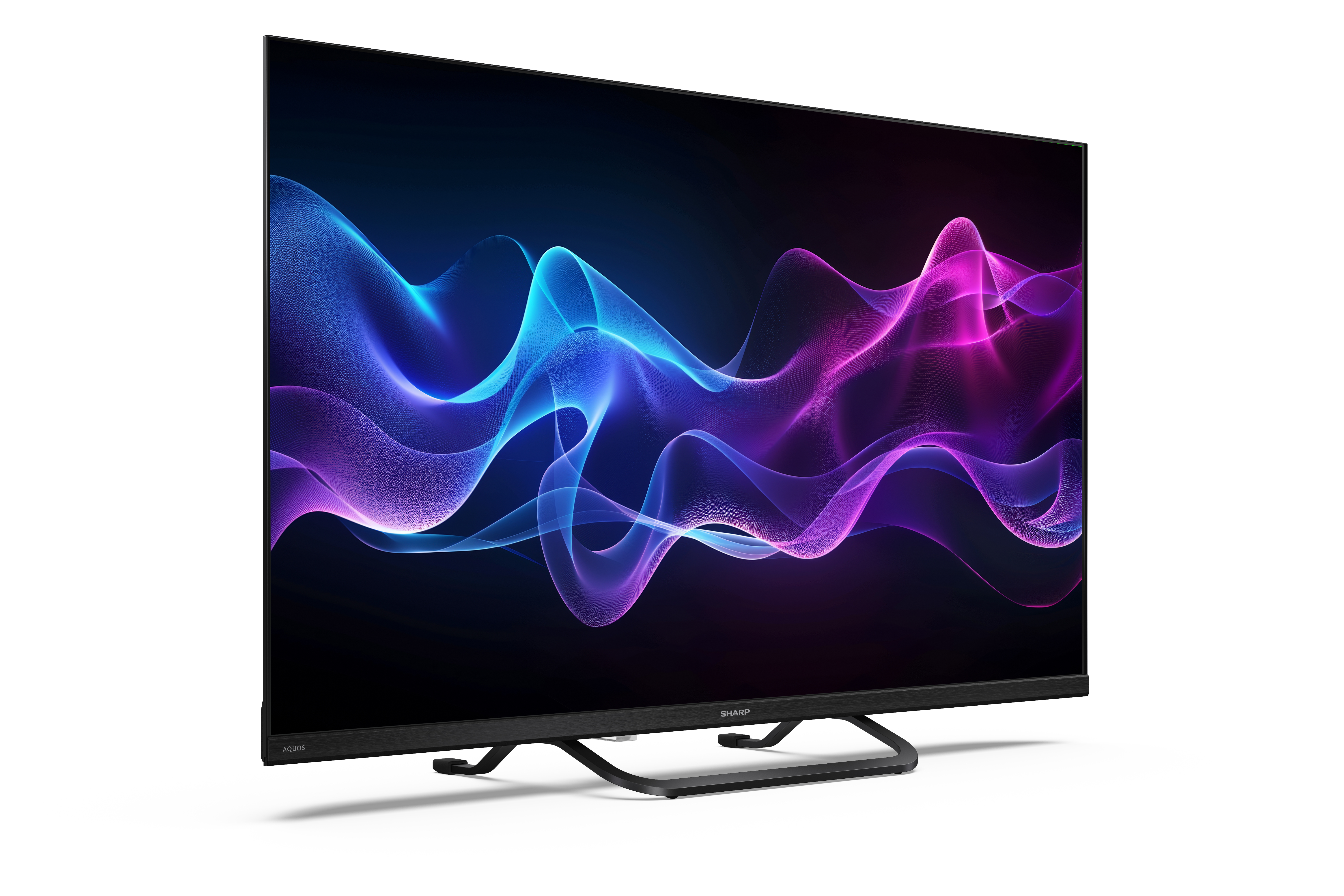 A Sharp TV színes hullámtervet jelenít meg. Fekete kerettel és állvánnyal rendelkezik, fehér háttér előtt.