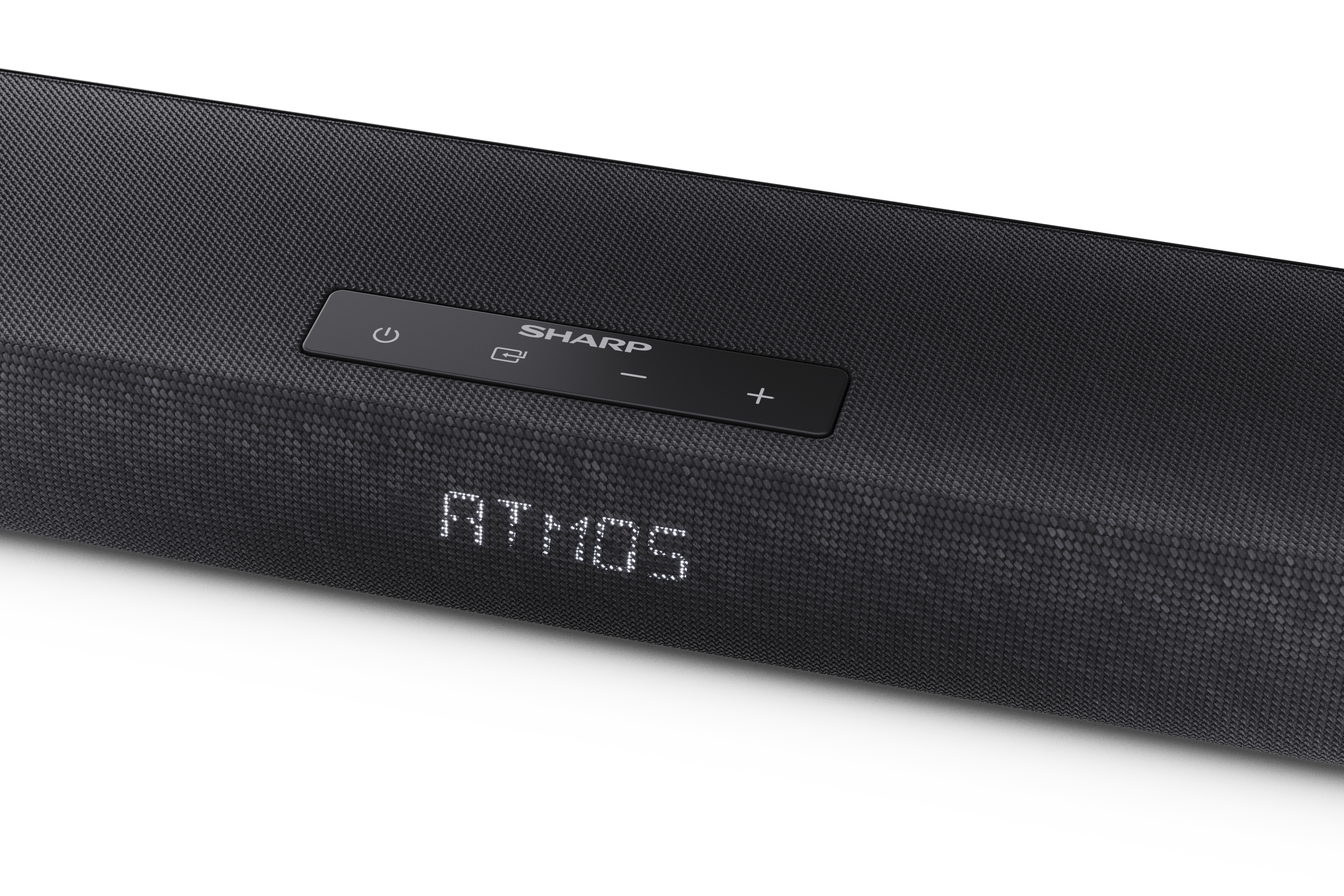 Egy fekete soundbar SHARP márkajelzéssel és ATMOS felirattal az elején. Van rajta bekapcsoló gomb és más gombok.