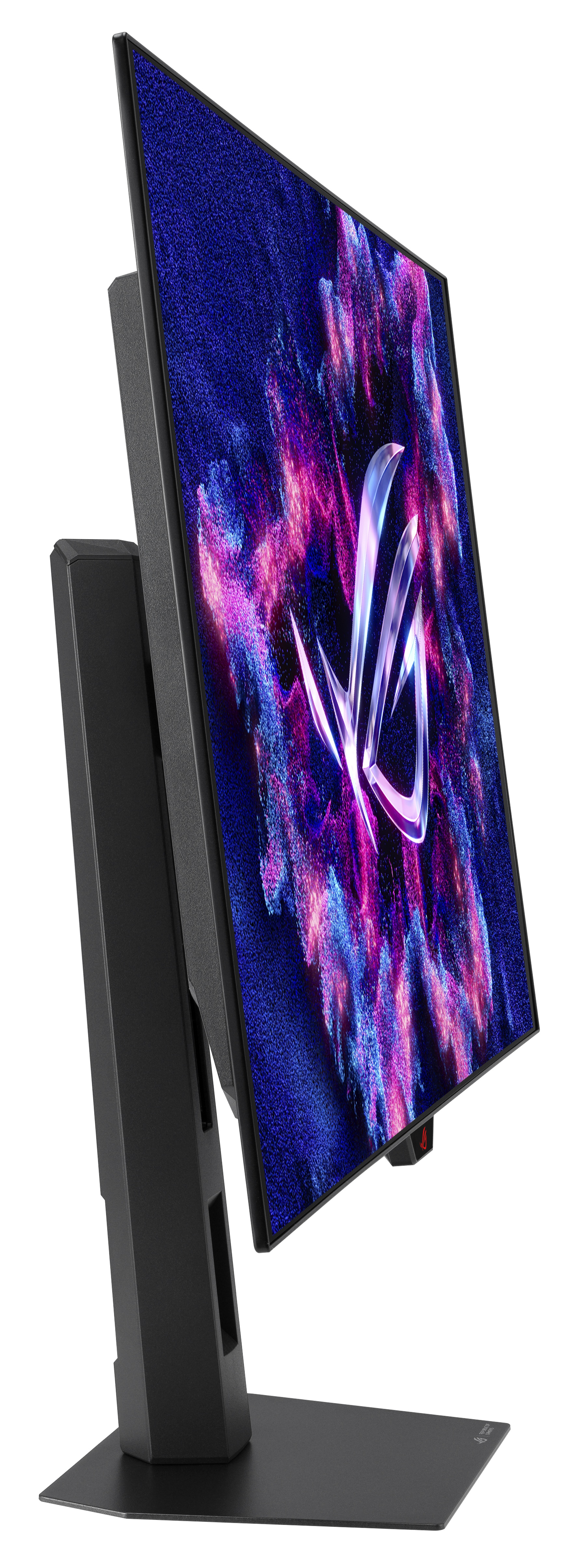 Czarny monitor komputera, pochylony, wyświetla kolorowy abstrakcyjny obraz. Spoczywa na czarnym stojaku na białym tle.