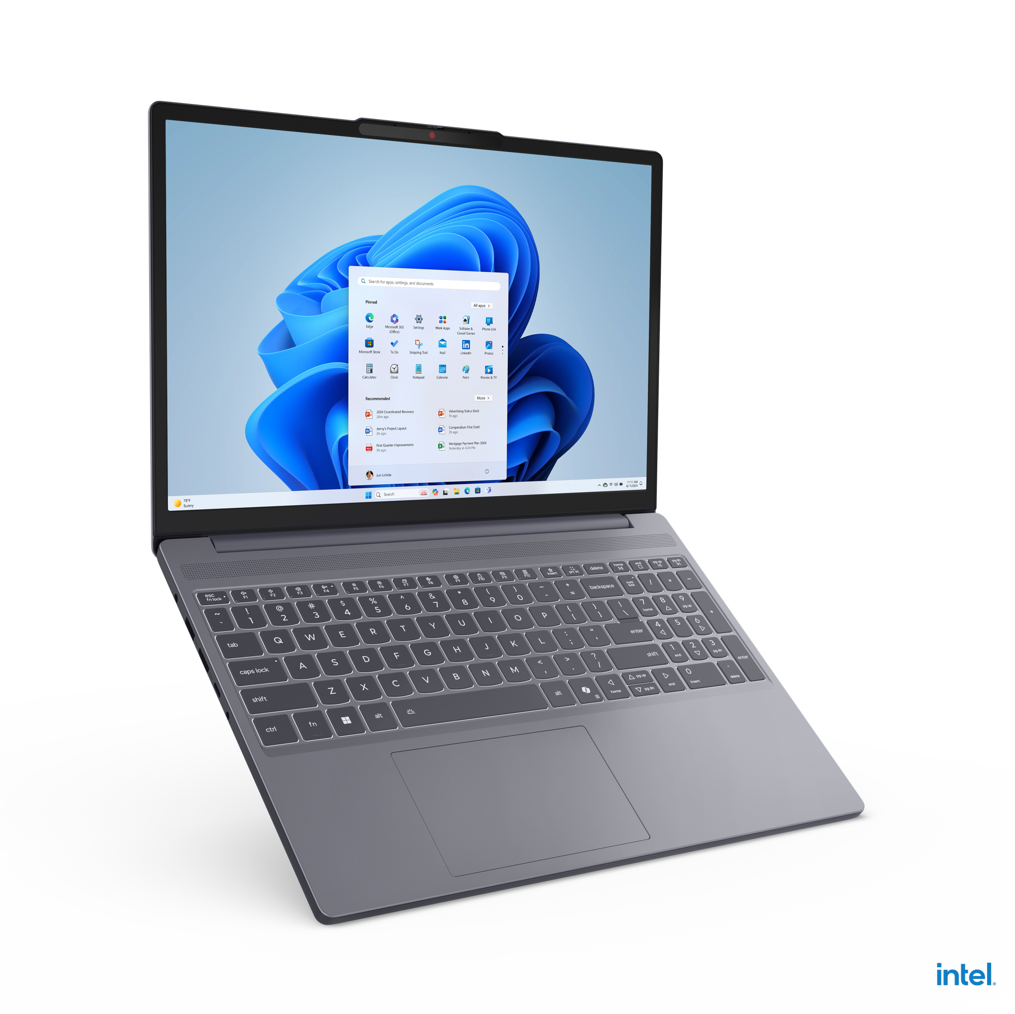 Windows 11 arayüzüne sahip gri bir dizüstü bilgisayar açık. Ekran başlangıç menüsünü gösteriyor. Intel logosu sağ altta.