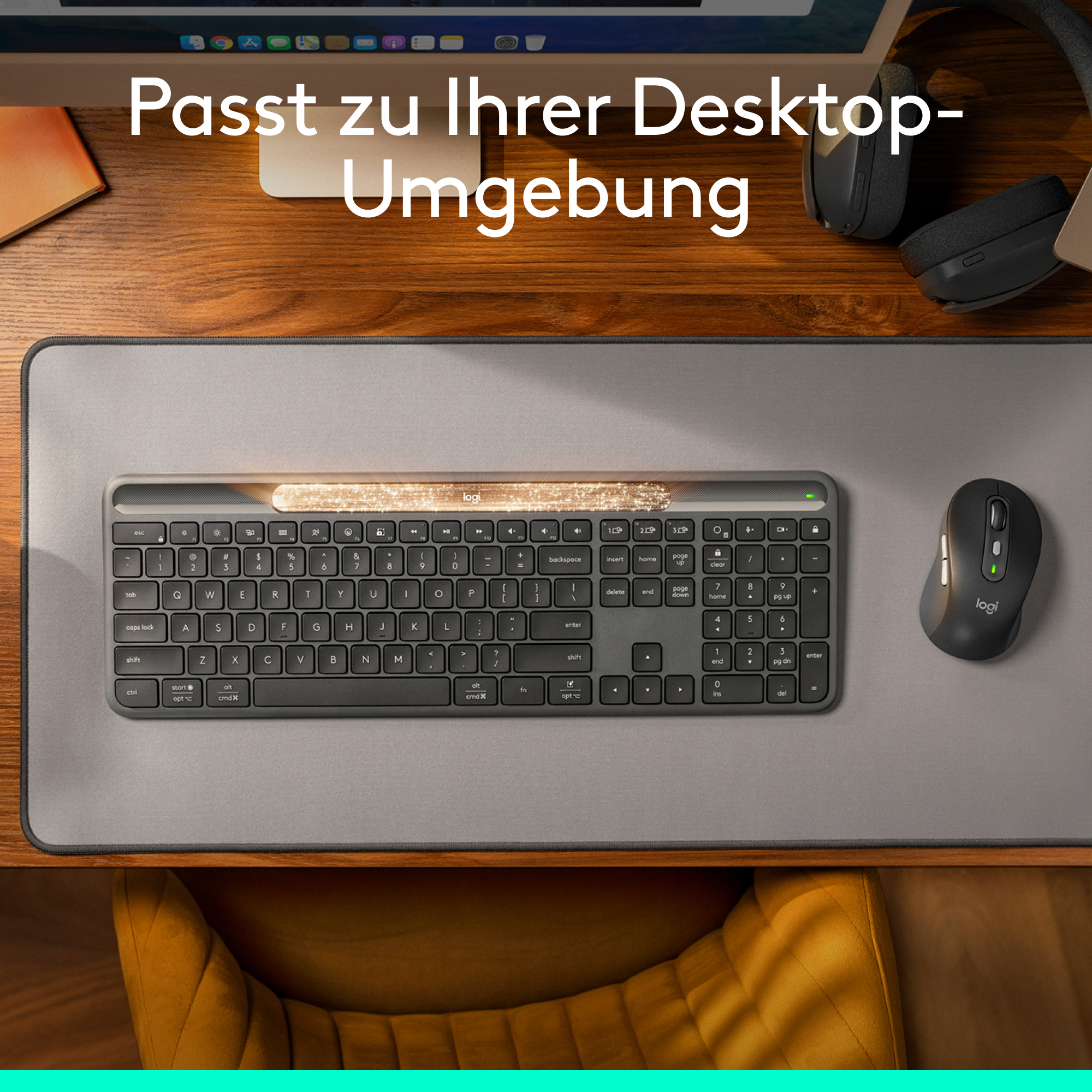 Ein Tastatur- und Maus-Set auf einem grauen Pad. Holzschreibtisch mit den Worten 'Passt zu Ihrer Desktop-Umgebung'.