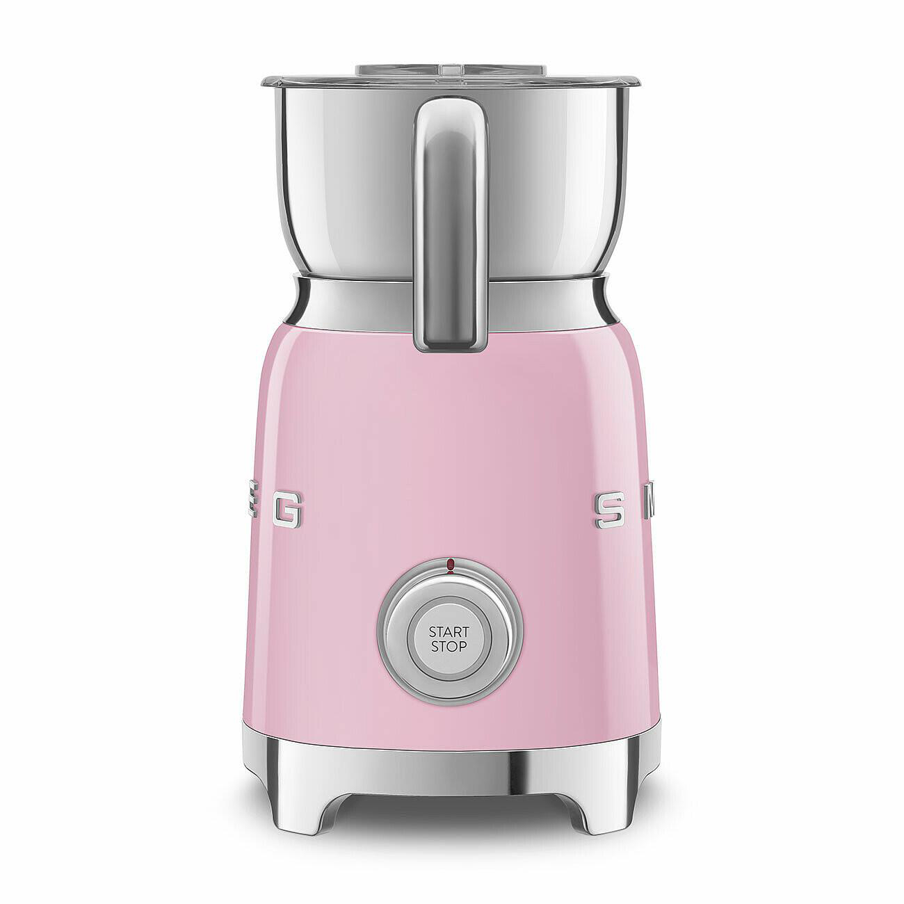 Ein rosa-silbernes Küchengerät, möglicherweise eine Mühle, mit einer „Start/Stop“-Taste. Das Design ist im Retro-Stil gehalten und modern.