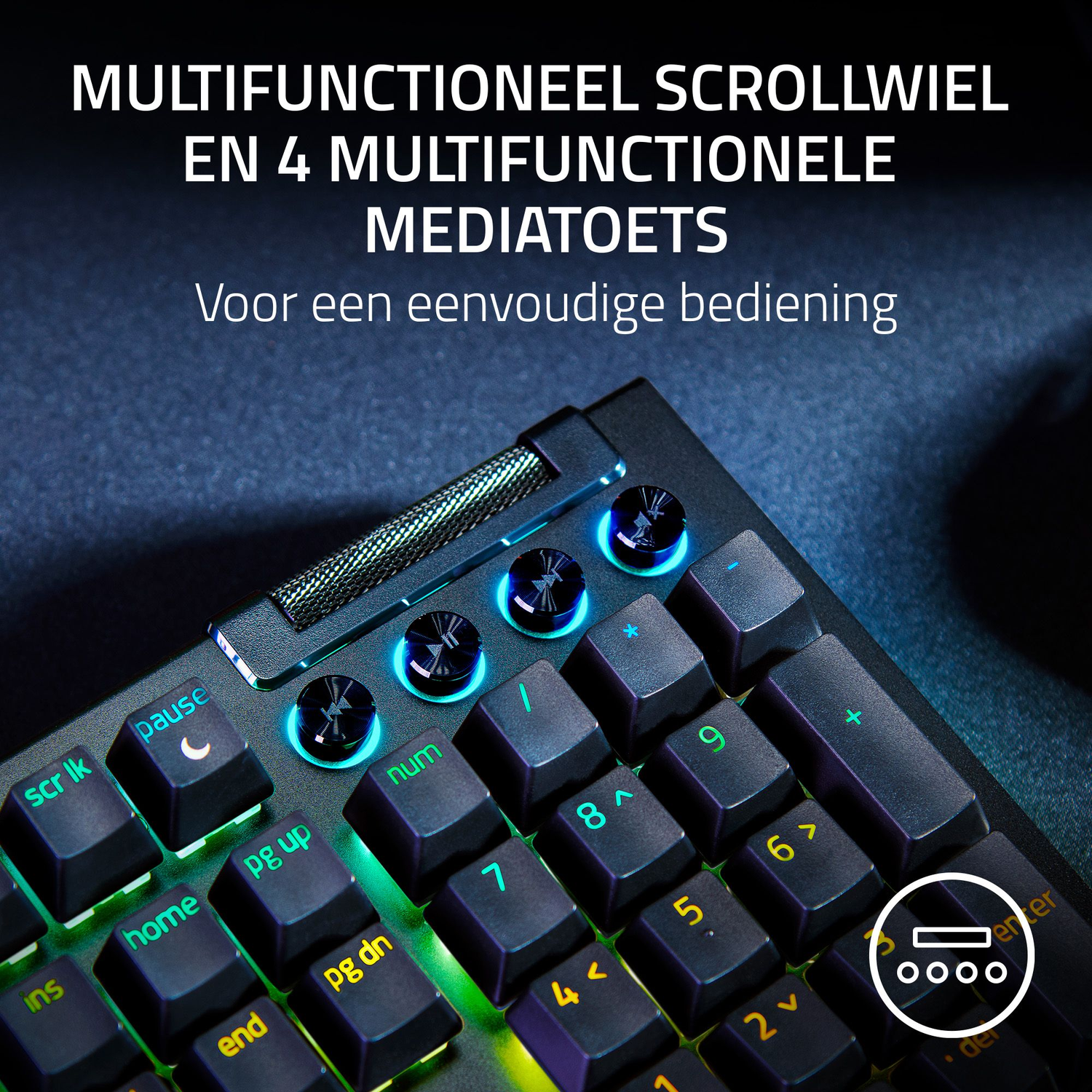 Close-up van een zwart toetsenbord met verlichte toetsen. Mediaknoppen en een scrollwiel bovenaan.