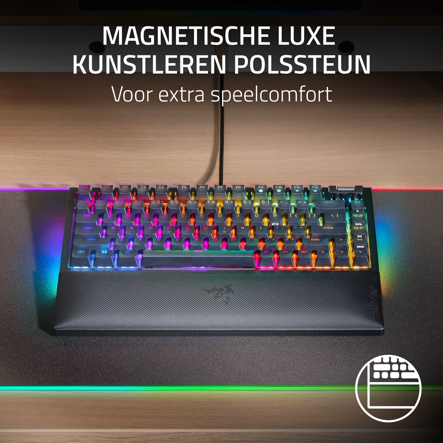 Een toetsenbord met RGB-verlichting ligt op een bureau. Het heeft een polssteun. Boven staat de tekst: Magnetic luxe kunstleren polssteun.