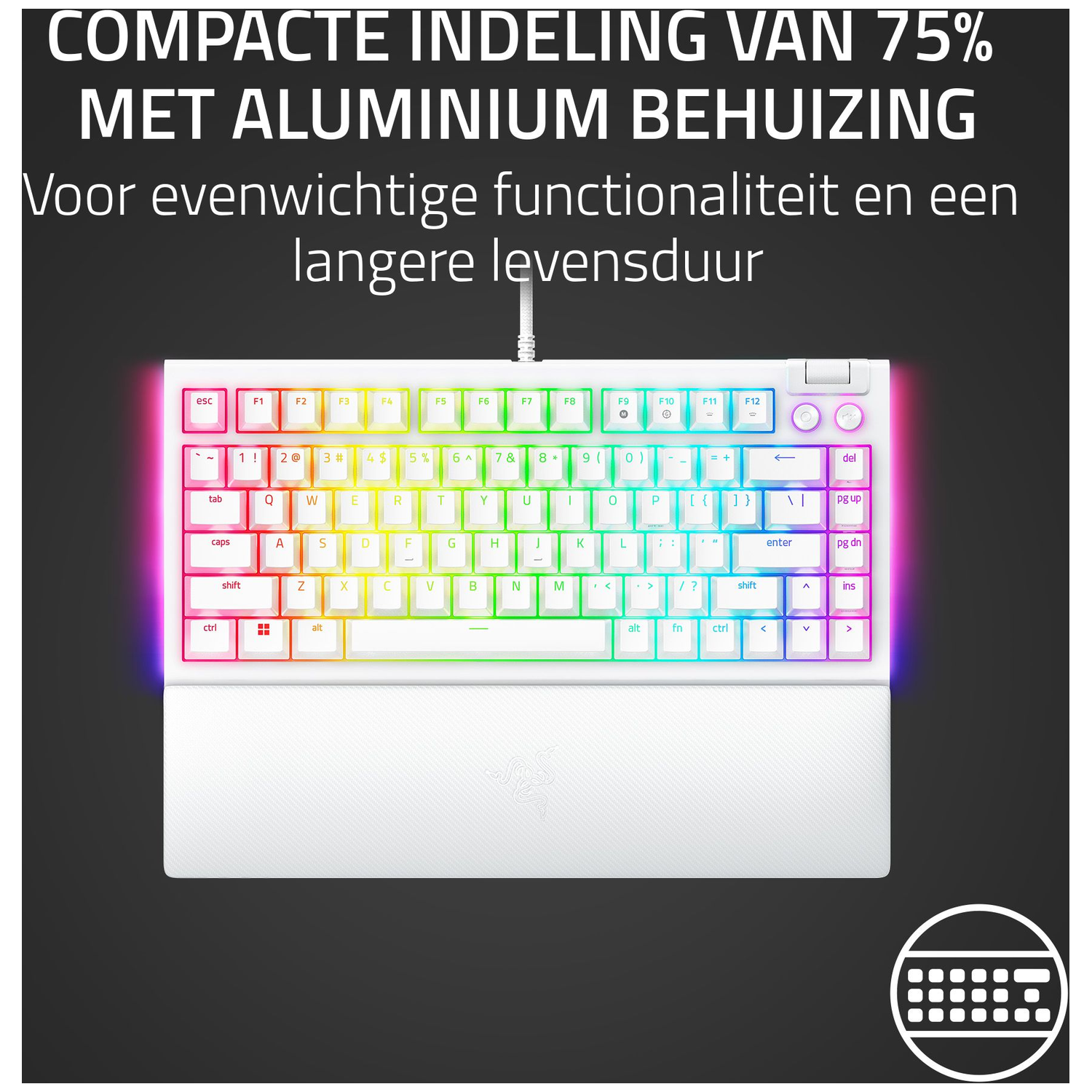 White keyboard with rainbow-colored keys. Text at the top reads, "COMPACTE INDELING VAN 75% MET ALUMINIUM BEHUIZING".