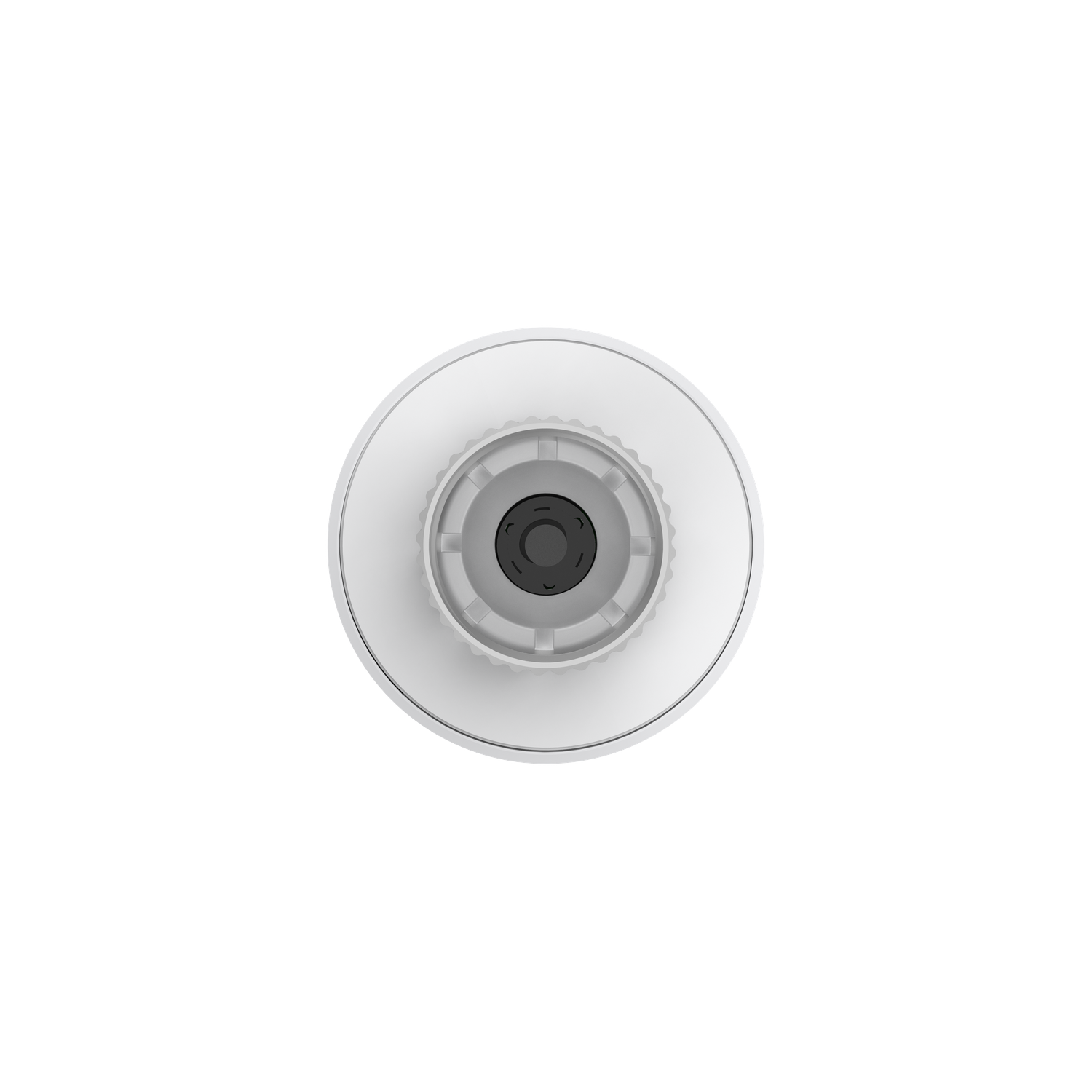Top-down view of a white, circular device with a gray center. The device has ridges and a black, central element. All on a white background.