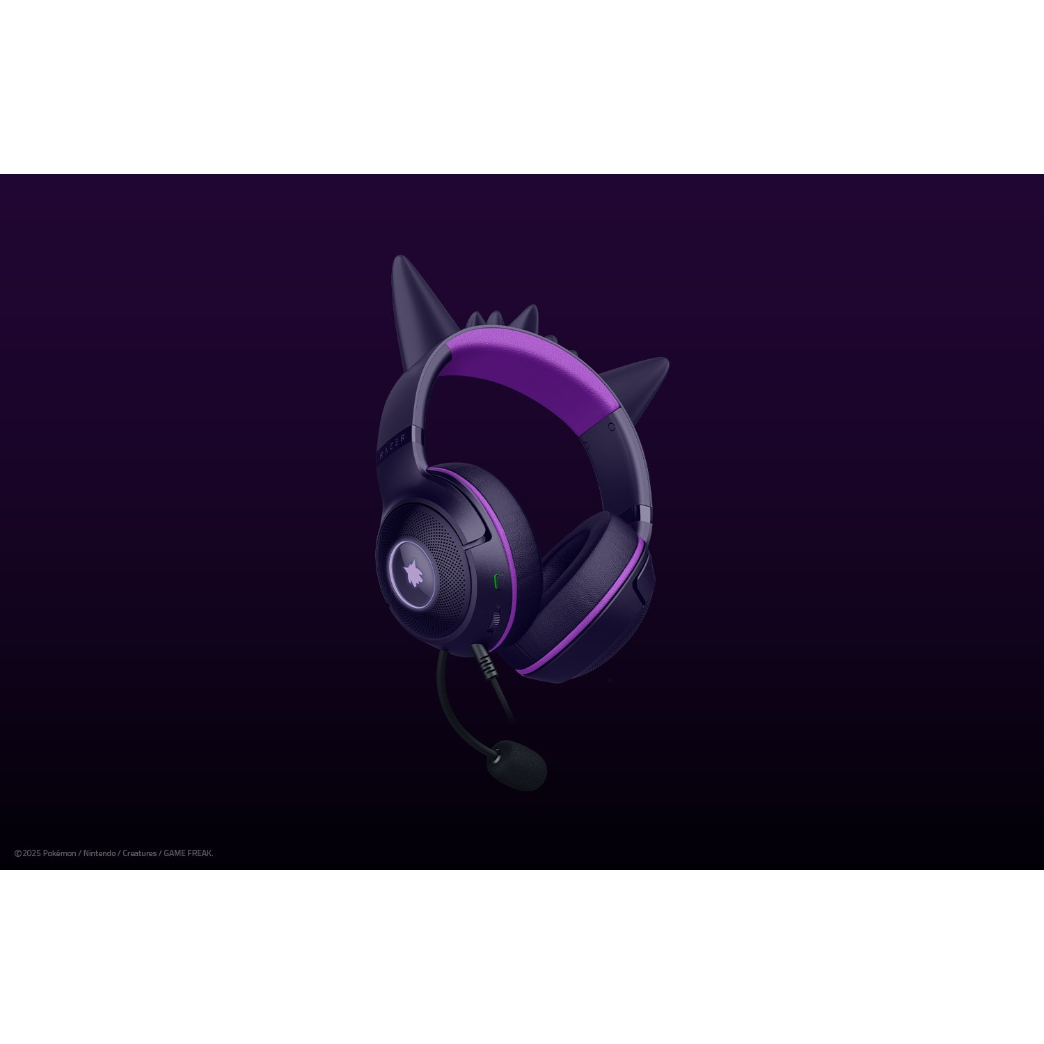 Headphones with cat ear design, purple and black color scheme. Includes a microphone. Set against a dark purple background.