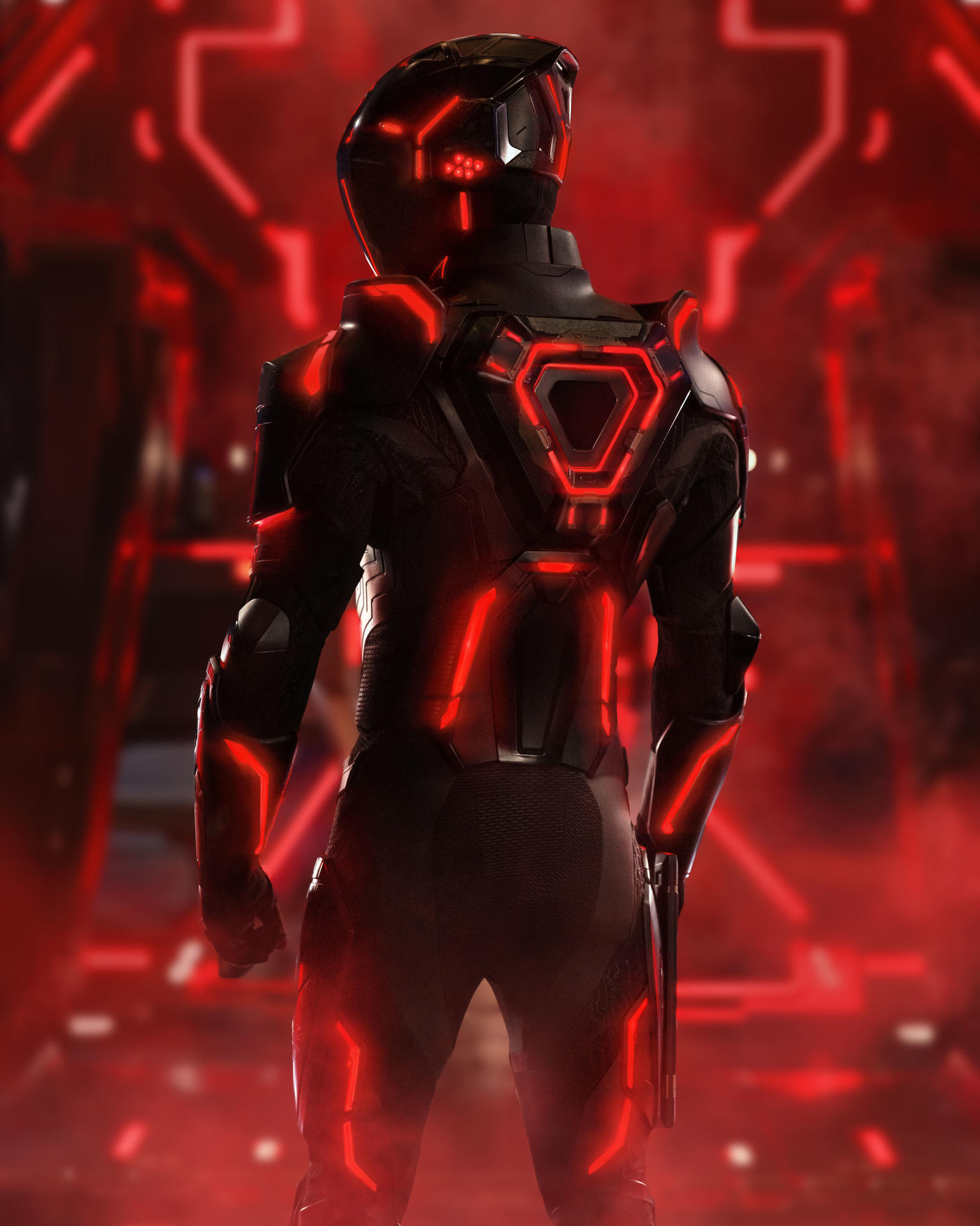 Eine Person in einem schwarzen, futuristischen Anzug mit roten leuchtenden Linien, Helm und einer Pistole. Steht in einem rot beleuchteten Korridor.