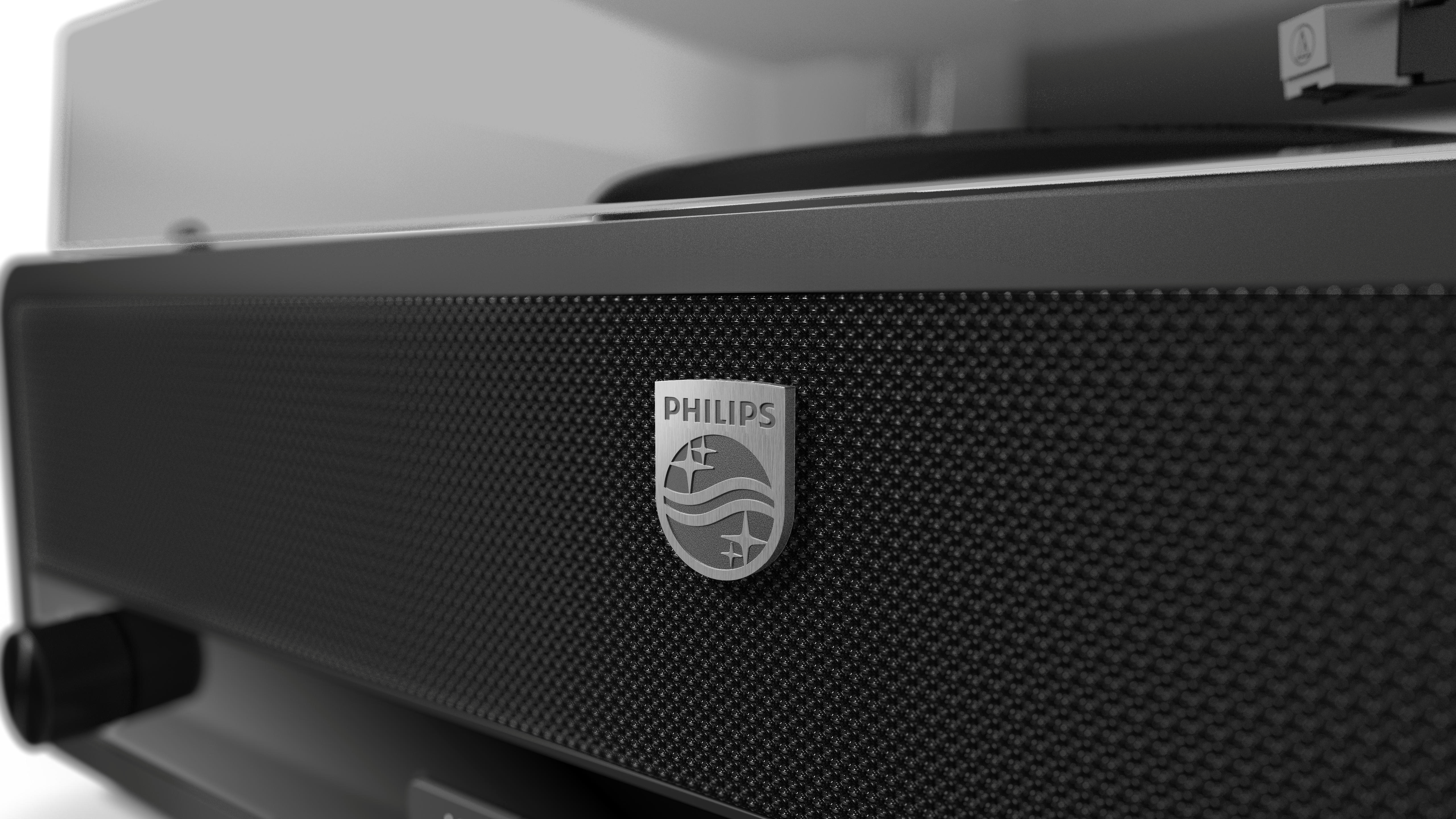 Nahaufnahme eines schwarzen Philips-Plattenspielers. Das Philips-Logo ist sichtbar. Die Textur ist ein Muster aus kleinen Punkten.