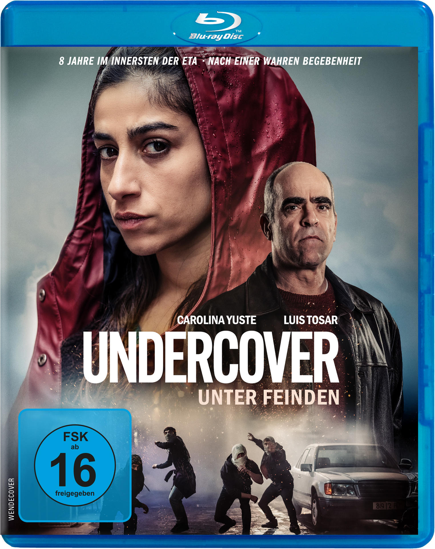 Blu-ray-Cover mit zwei Personen im Zentrum. Titel: UNDERCOVER. Unten rennen Leute in der Nähe eines Autos. Bewertung ist FSK 16.