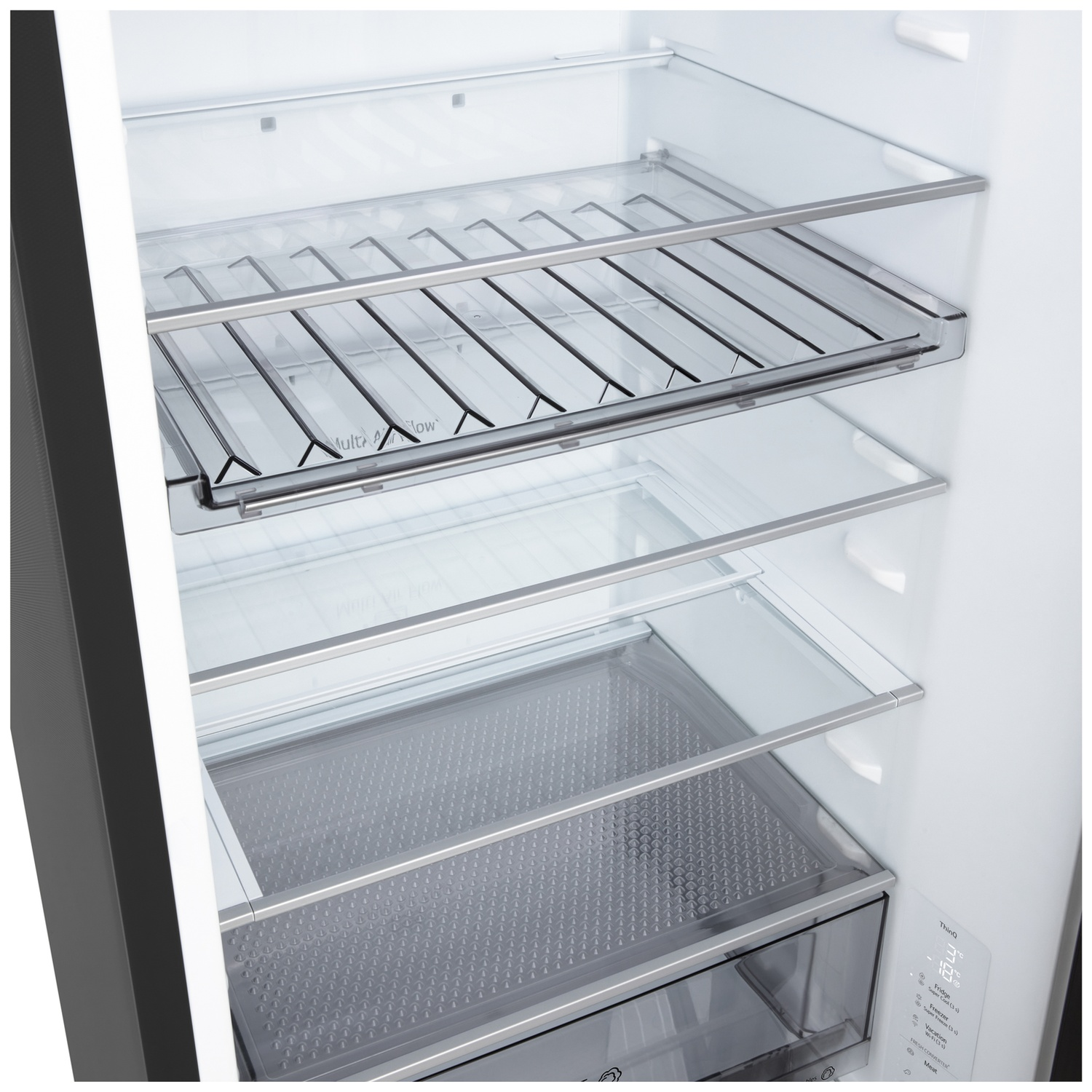 Inside a refrigerator, glass shelves and drawers are visible. Stainless steel frames support the glass. The inside is white.