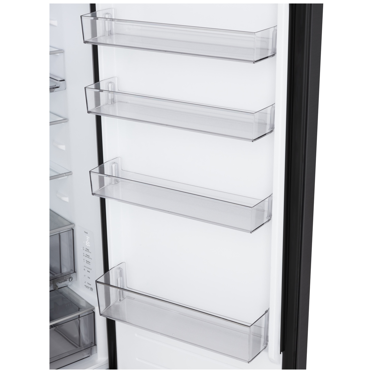 Inside a refrigerator door with clear plastic shelves. The door is black-framed. The interior is white.