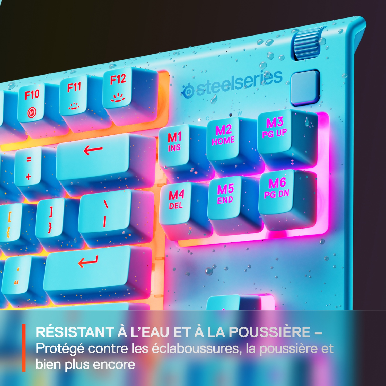 Close-up of a blue and pink backlit keyboard. Keys are labeled with symbols and functions. Water droplets are visible on the surface.