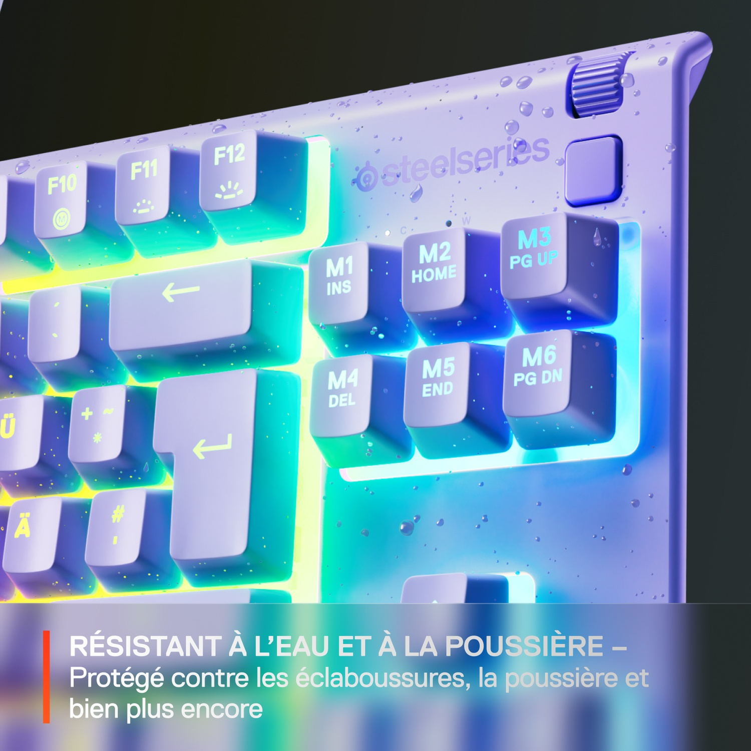 Close-up of a keyboard with illuminated keys. The keyboard is light purple and has water droplets on it. The brand name is visible.