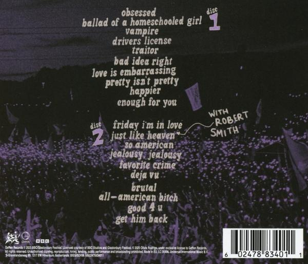 Album-Rückseite mit Konzertpublikum. Titelliste und 'With Robert Smith' sind sichtbar. Überwiegend violette Farbgebung.