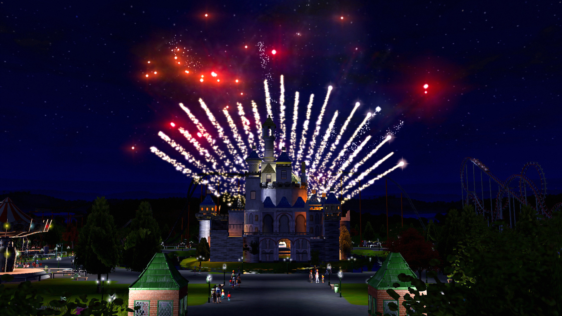 Feuerwerk explodiert über einem Schloss bei Nacht. Im Hintergrund eine Achterbahn und ein Park, davor eine Menschenmenge.