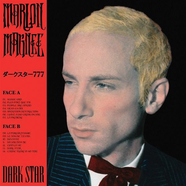 Albumcover: Portrait eines Mannes mit blonden Haaren und dunklem Anzug. Roter Text oben und unten. Tracklisten von Seite A und B sichtbar.