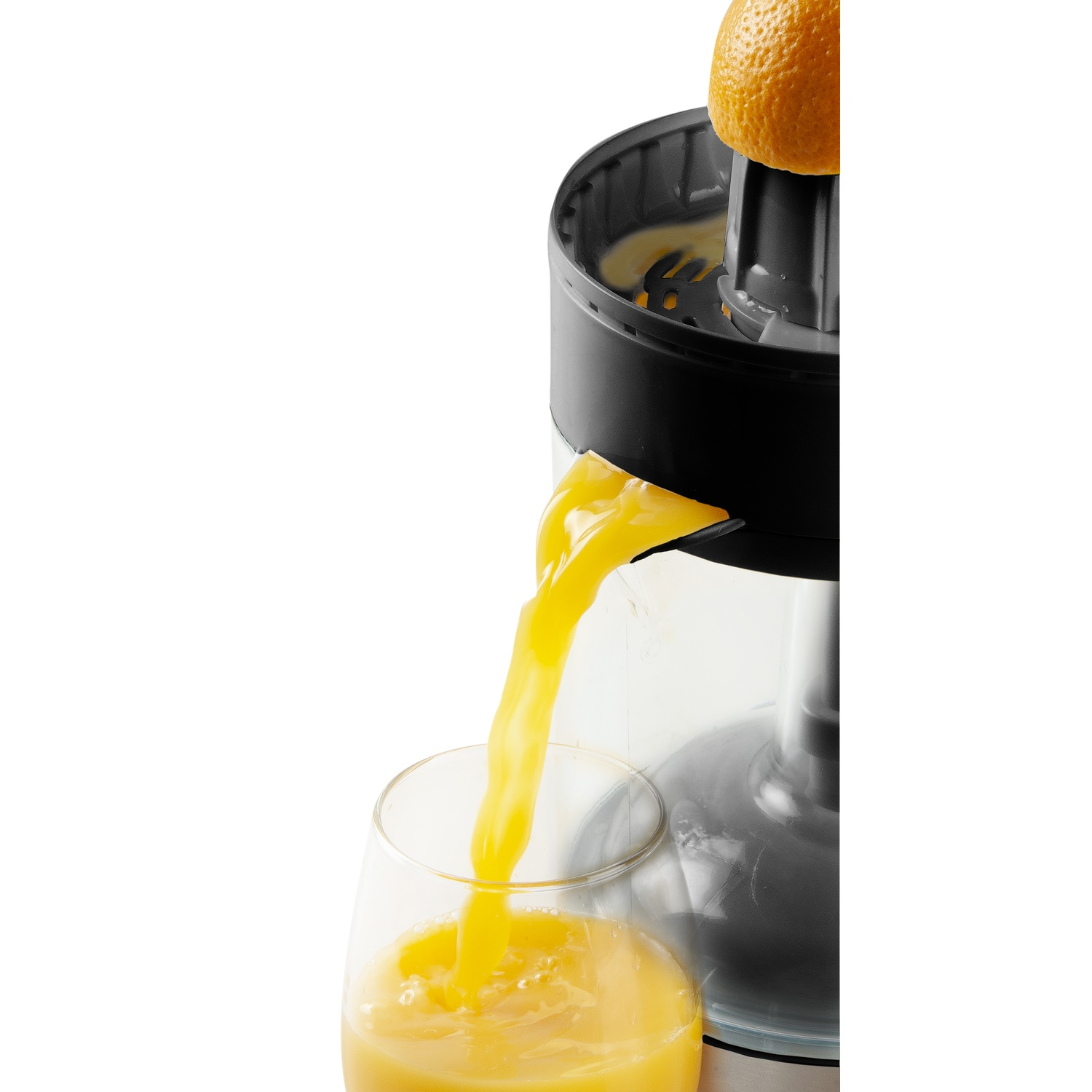An orange is being juiced. The yellow juice flows into a clear glass. A juicer is on the right, and the background is white.