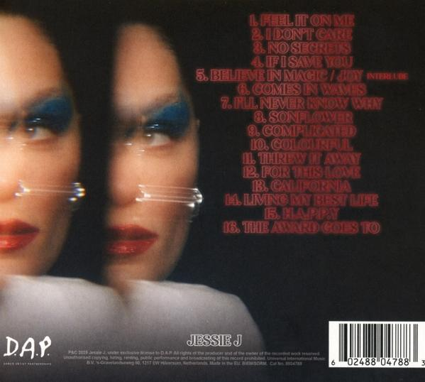 Albumcover mit verschwommenem Gesicht von Jessie J und Titelliste auf schwarzem Hintergrund. Roter Text, Barcode unten rechts.