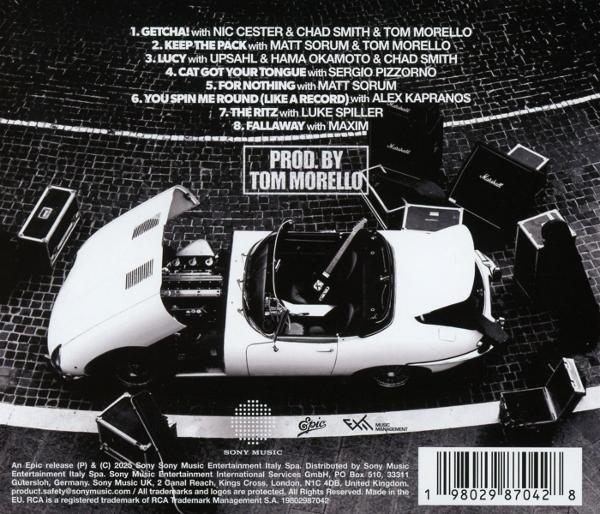 Albumcover: Weißes Auto mit offener Motorhaube, verschiedene Musikausrüstung darum. Text oben und unten.