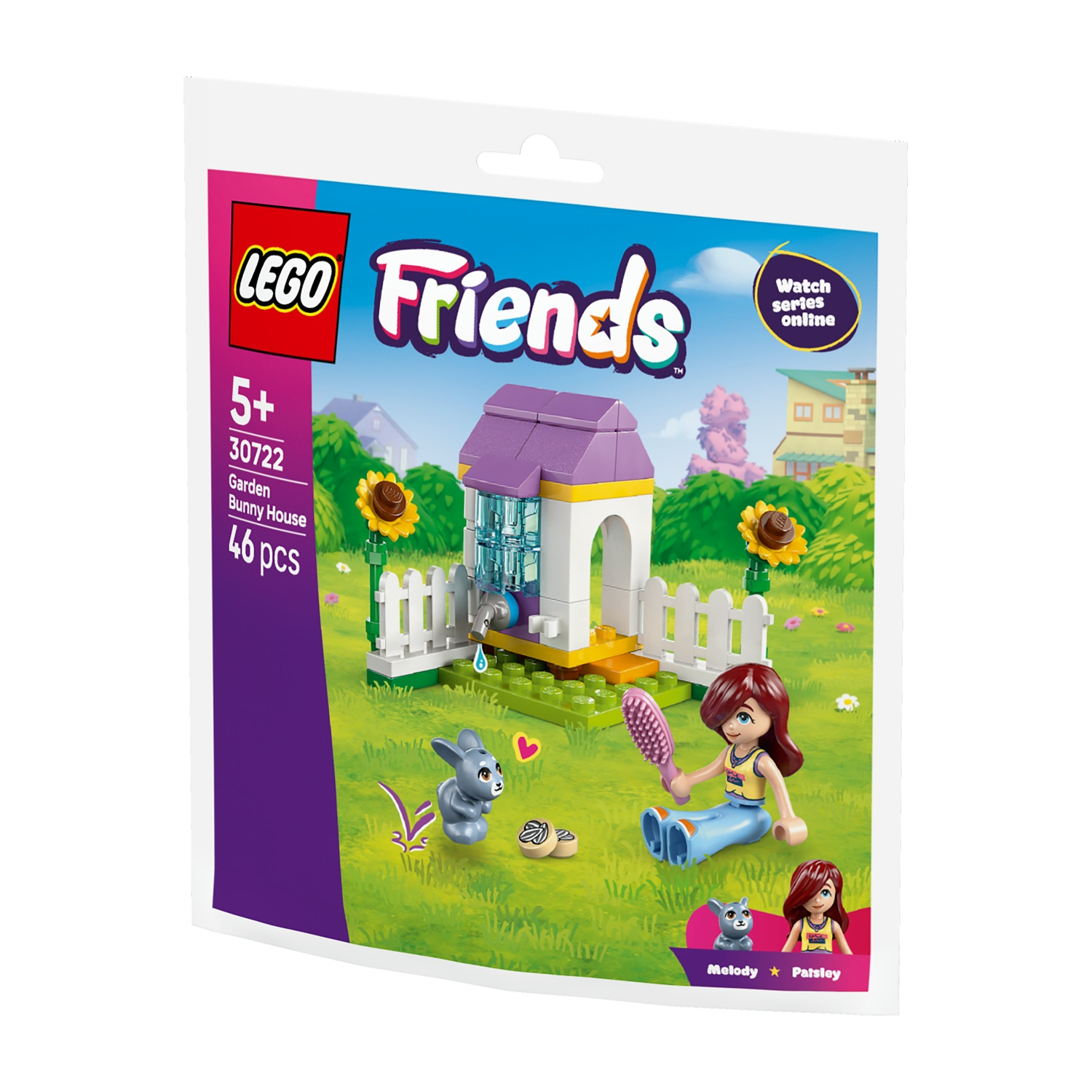 Set LEGO Friends: Garden Bunny House. Presenta una casa, un coniglio, una figura di ragazza e accessori. Il set è su un prato verde con fiori.