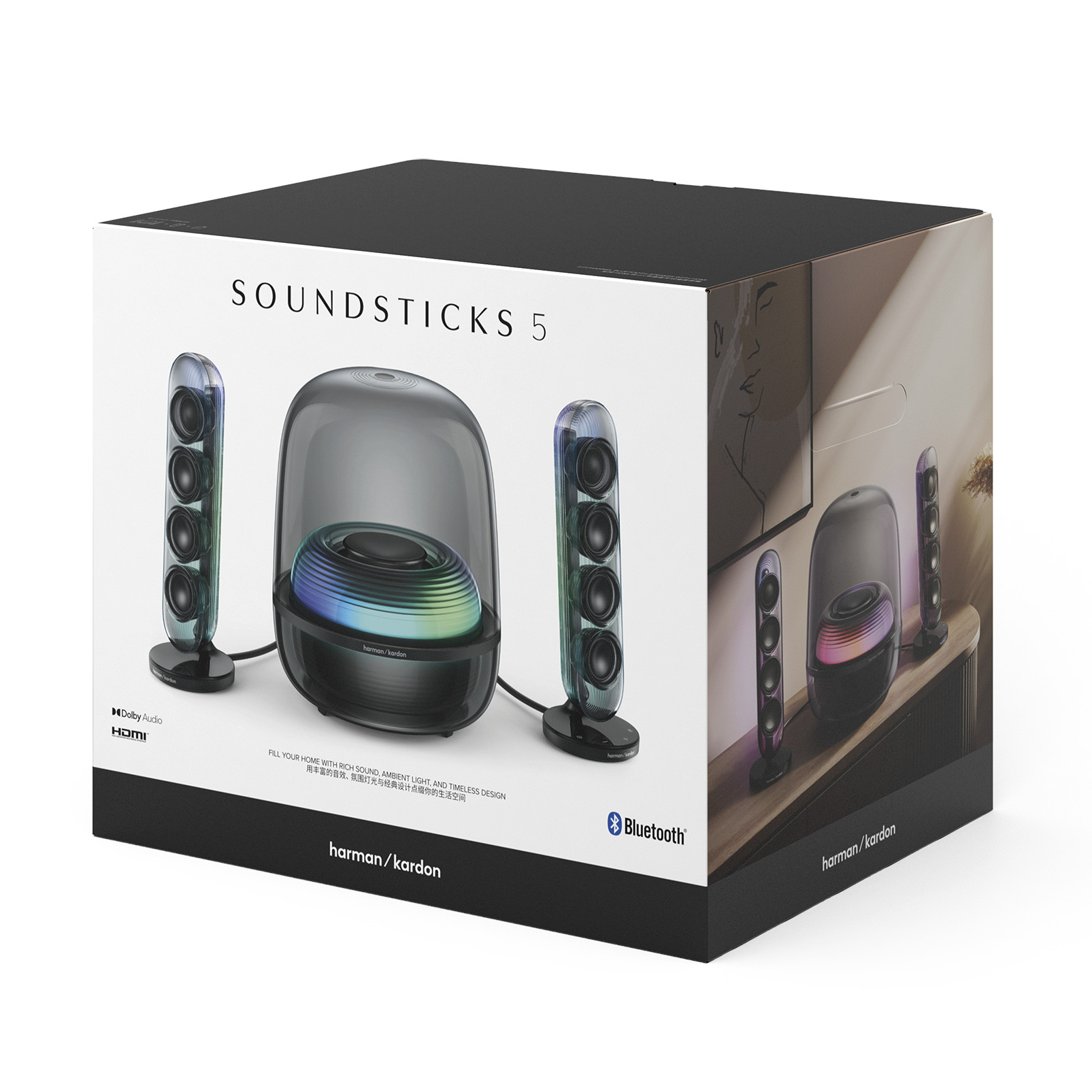 Schachtel mit Soundsticks 5-Lautsprechern. Verfügt über einen Subwoofer und zwei Satellitenlautsprecher. Harman/Kardon-Branding sichtbar.
