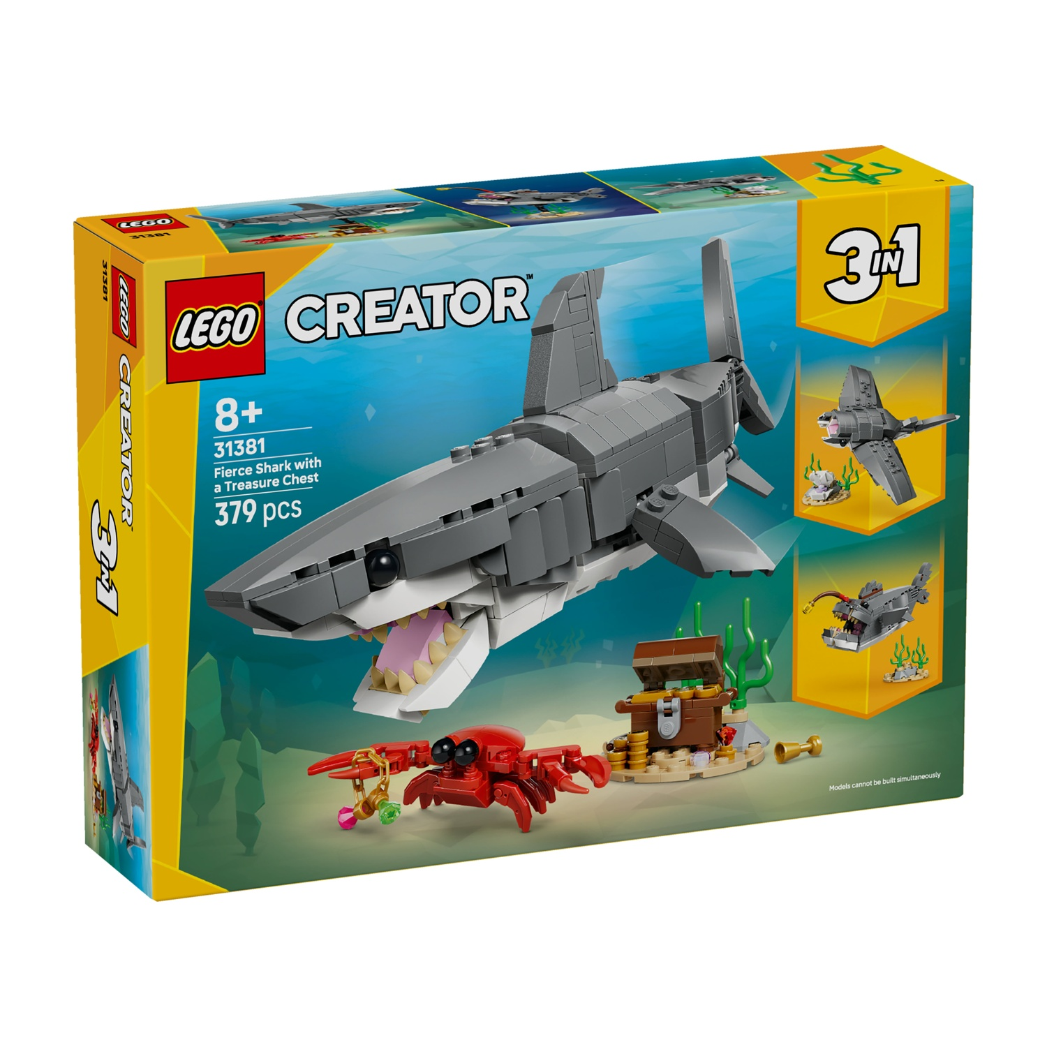 Set Lego Creator con squalo, granchio, forziere e design 3 in 1 sulla scatola. Lo squalo ha le fauci aperte.