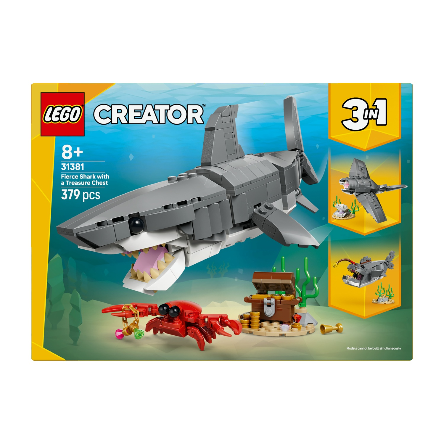 Set scatola Lego. Uno squalo grigio con la bocca aperta, un granchio rosso, un forziere e altre due costruzioni sono visibili.