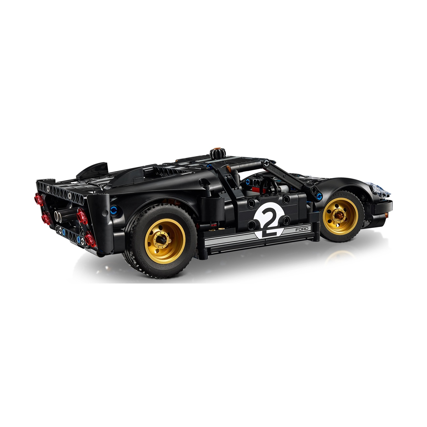 Un modello di auto da corsa Lego Ford GT nero. Ha cerchi dorati, il numero 2 sul lato e uno spoiler. L'auto è su sfondo bianco.