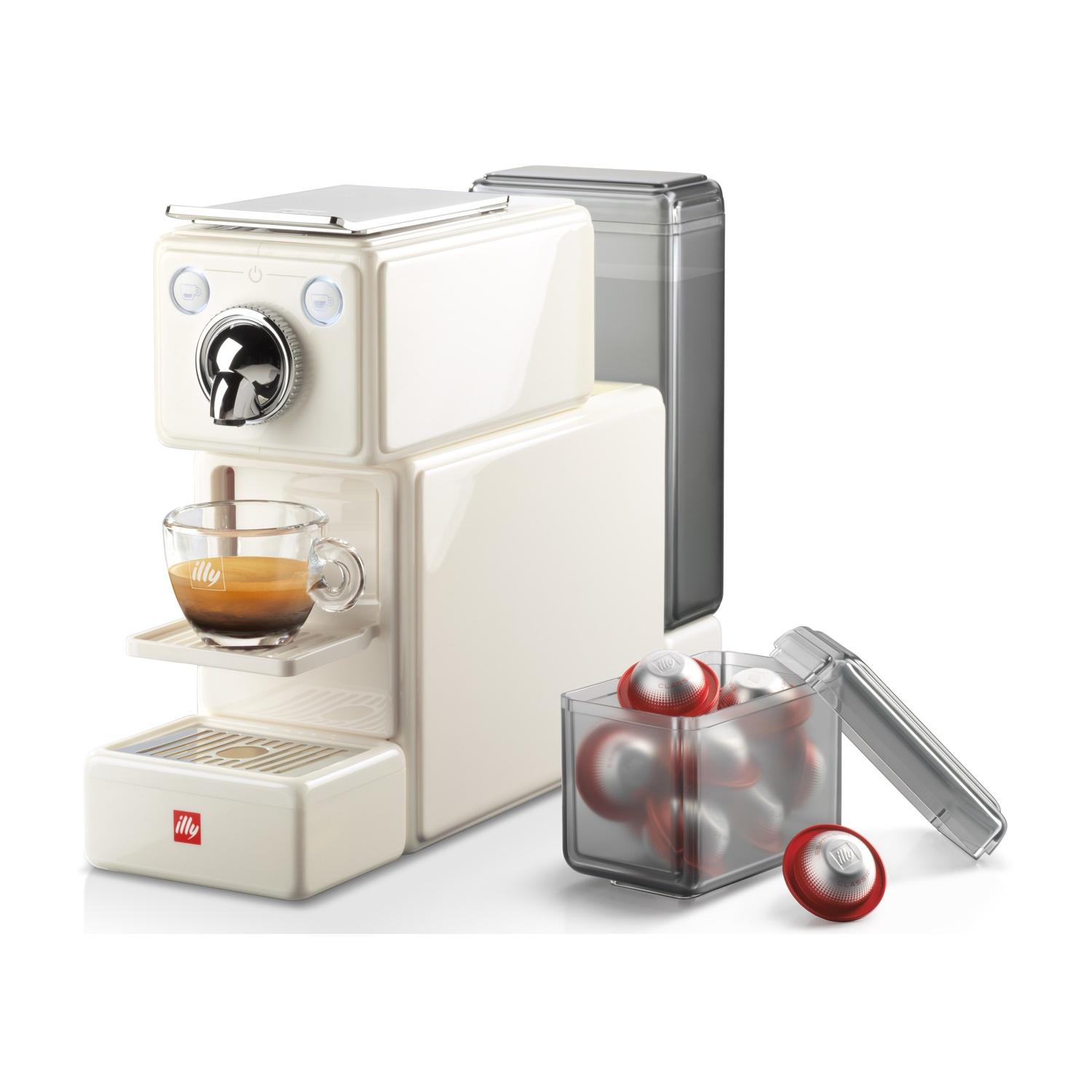 Macchina per caffè espresso color crema con un bicchiere di caffè. Un contenitore di capsule di caffè è accanto alla macchina.