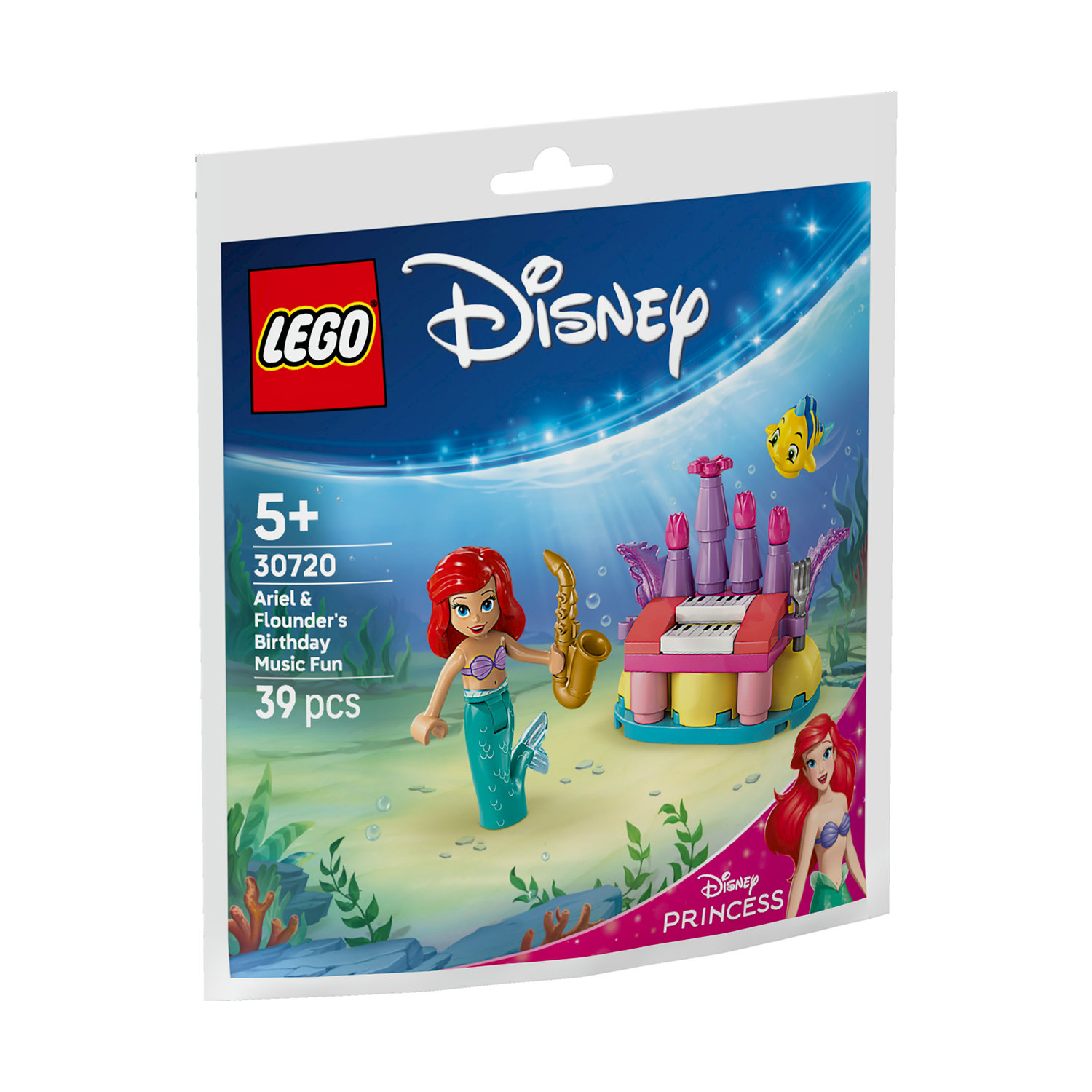 Set Lego Disney. Ariel tiene un sassofono vicino a una struttura simile a un pianoforte. Flounder nuota vicino. Il set è in un sacchetto di plastica.
