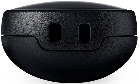 Nahaufnahme eines schwarzen, abgerundeten Geräts mit zwei rechteckigen Löchern. Das Gerät hat eine strukturierte Oberfläche und eine glatte, gewölbte Oberseite.