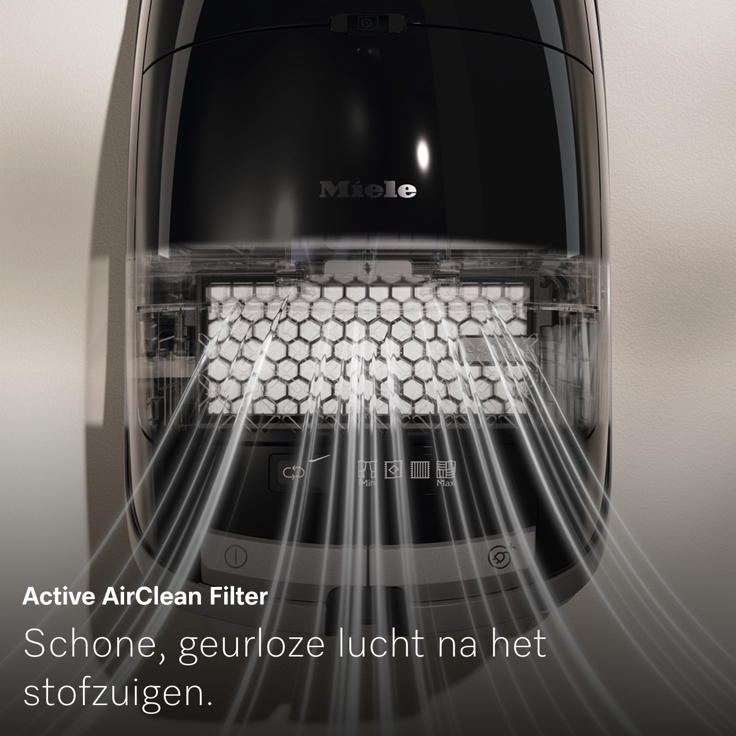 Black Miele vacuum cleaner showing the Active AirClean Filter. Light beams emanate from the filter. Text reads: Active AirClean Filter.