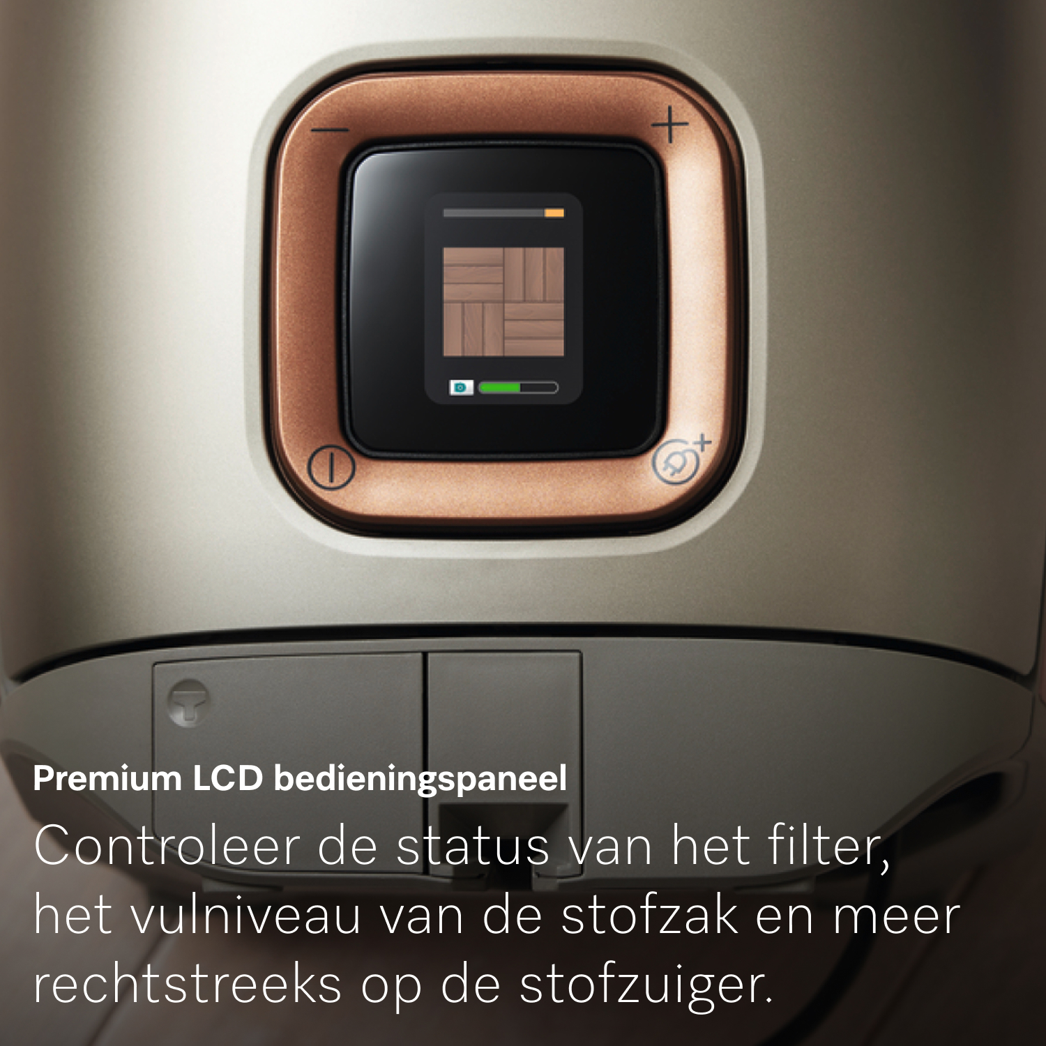 Close-up van een bedieningspaneel van een stofzuiger. Het heeft een scherm dat de status weergeeft. Er zijn plus- en minsymbolen en een aan/uit-knop.