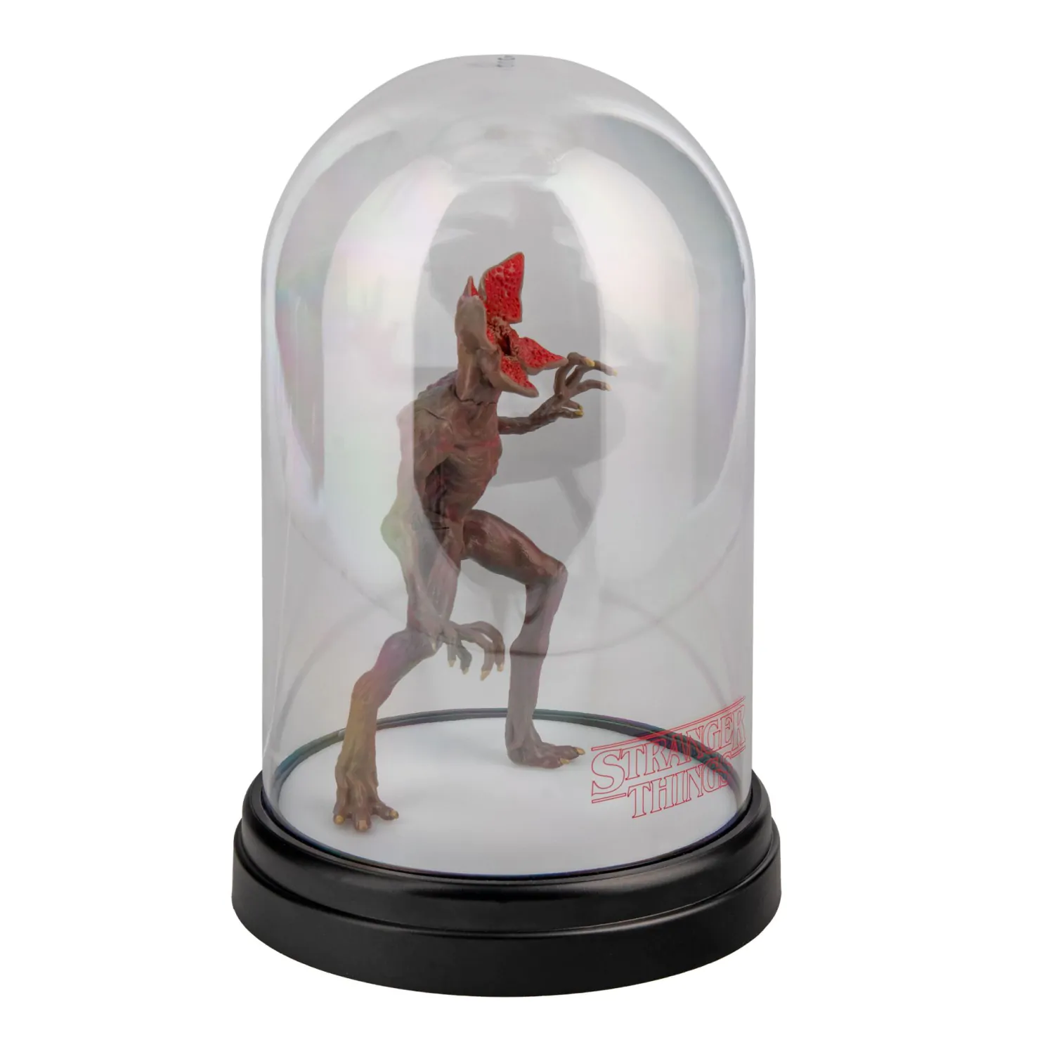 Una figura de Demogorgon dentro de una cúpula de cristal. Tiene una cara roja en forma de flor y está sobre una base negra con el logo de 'Stranger Things'.