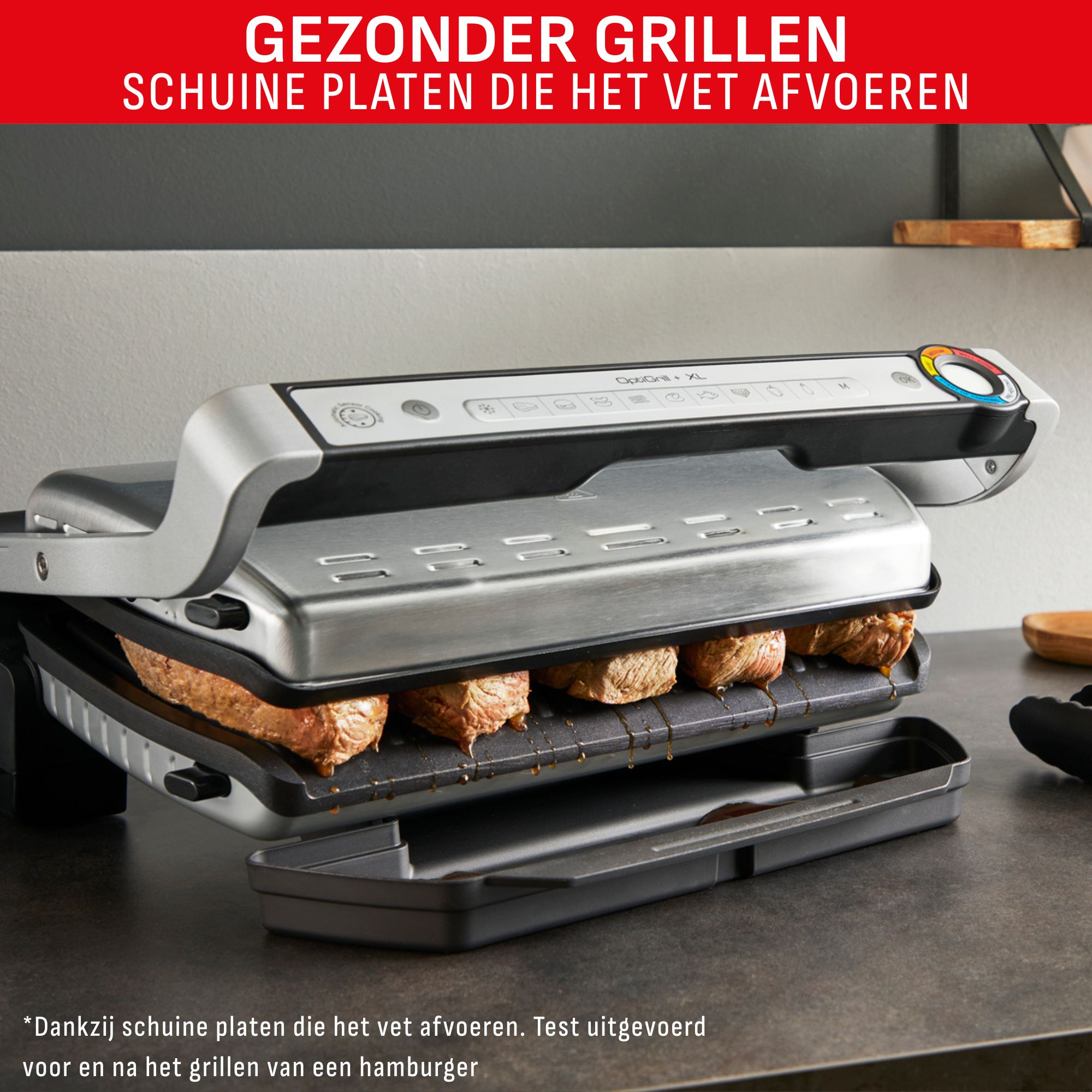A grill with meat cooking inside. It has a digital display and angled plates. The background is a kitchen.