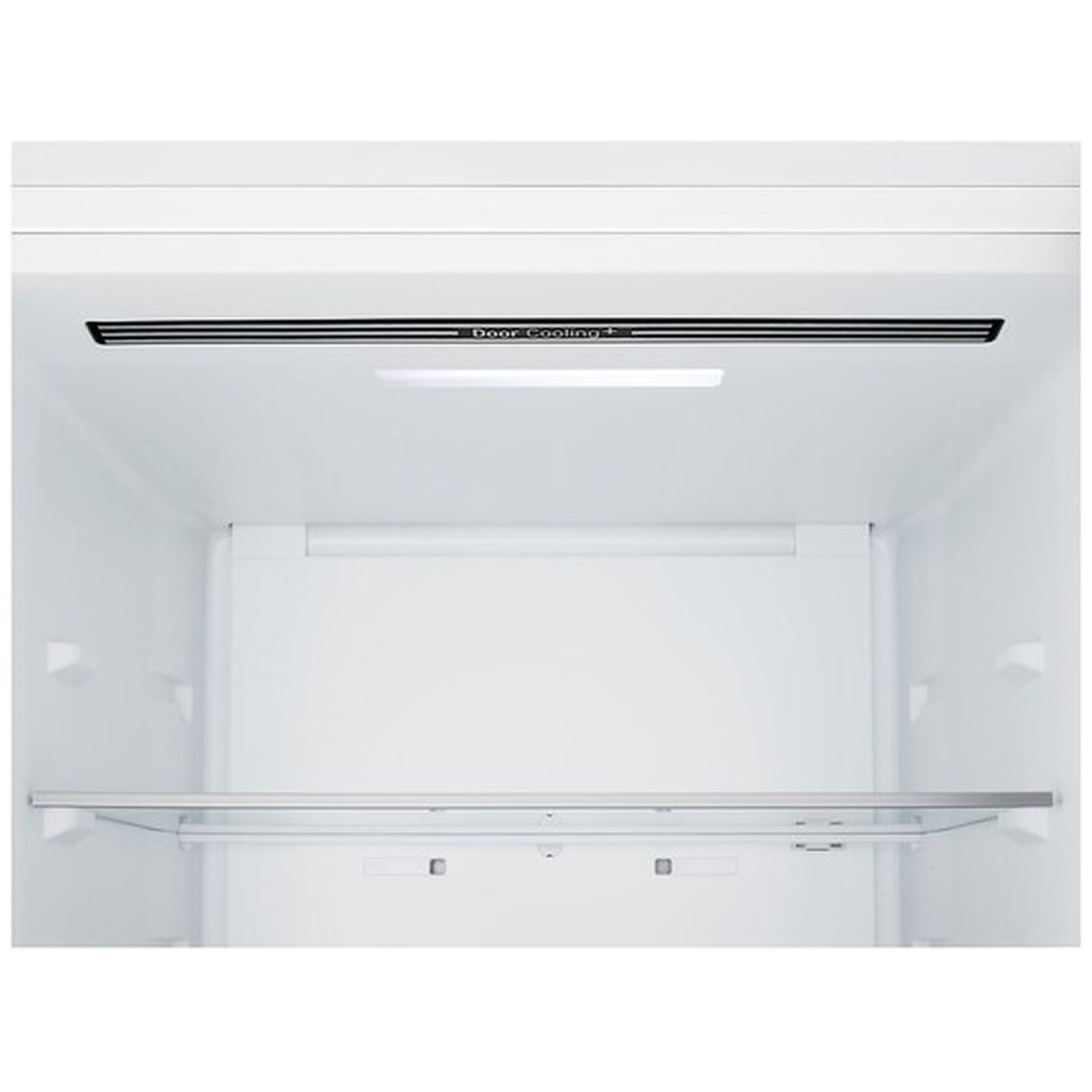 Inside of a white refrigerator. A shelf is in the middle. The words 'Door Cooling +' are above a light.